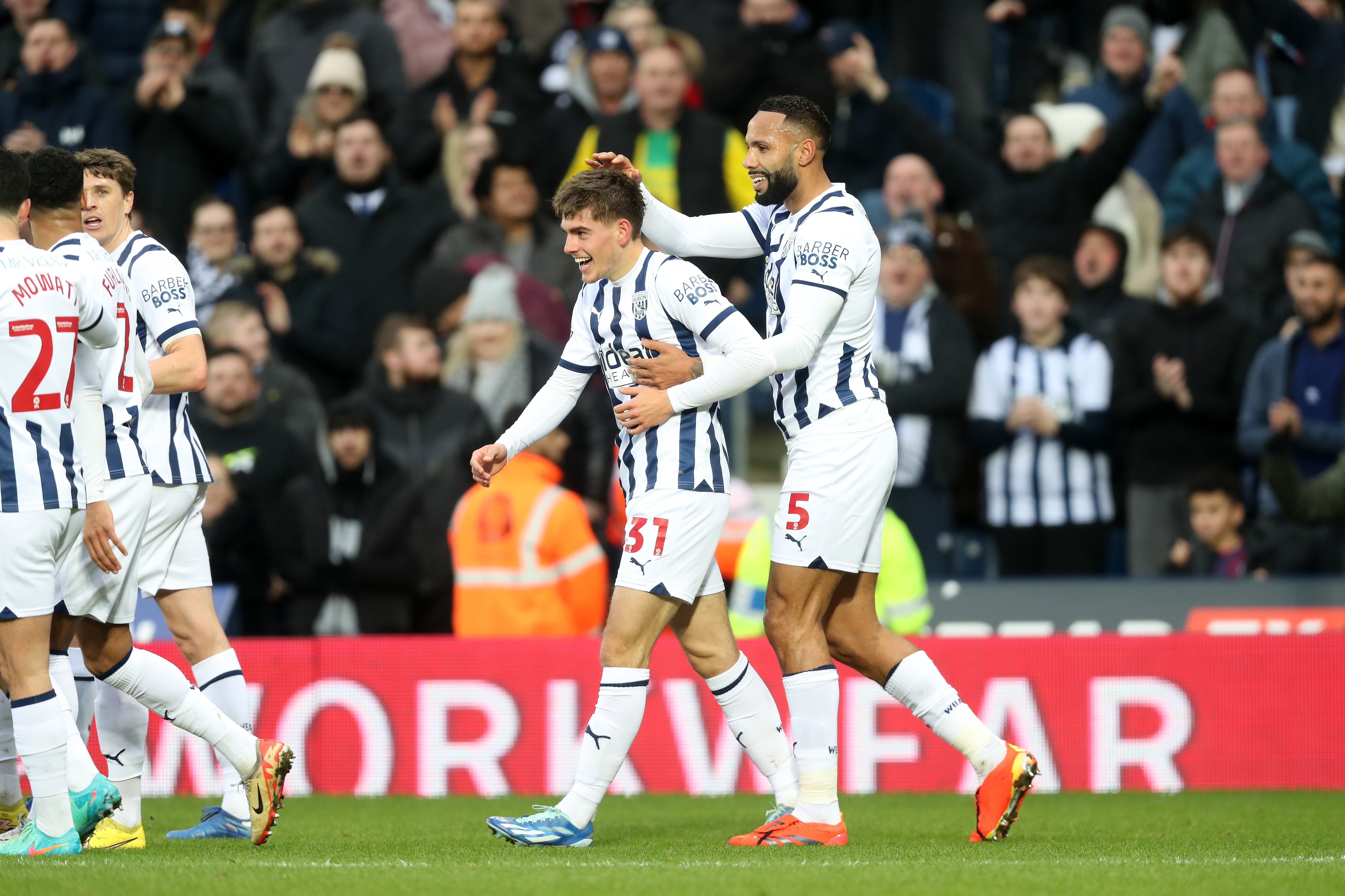 Kyle Bartley celebrates with Tom Fellows after his Blackburn goal