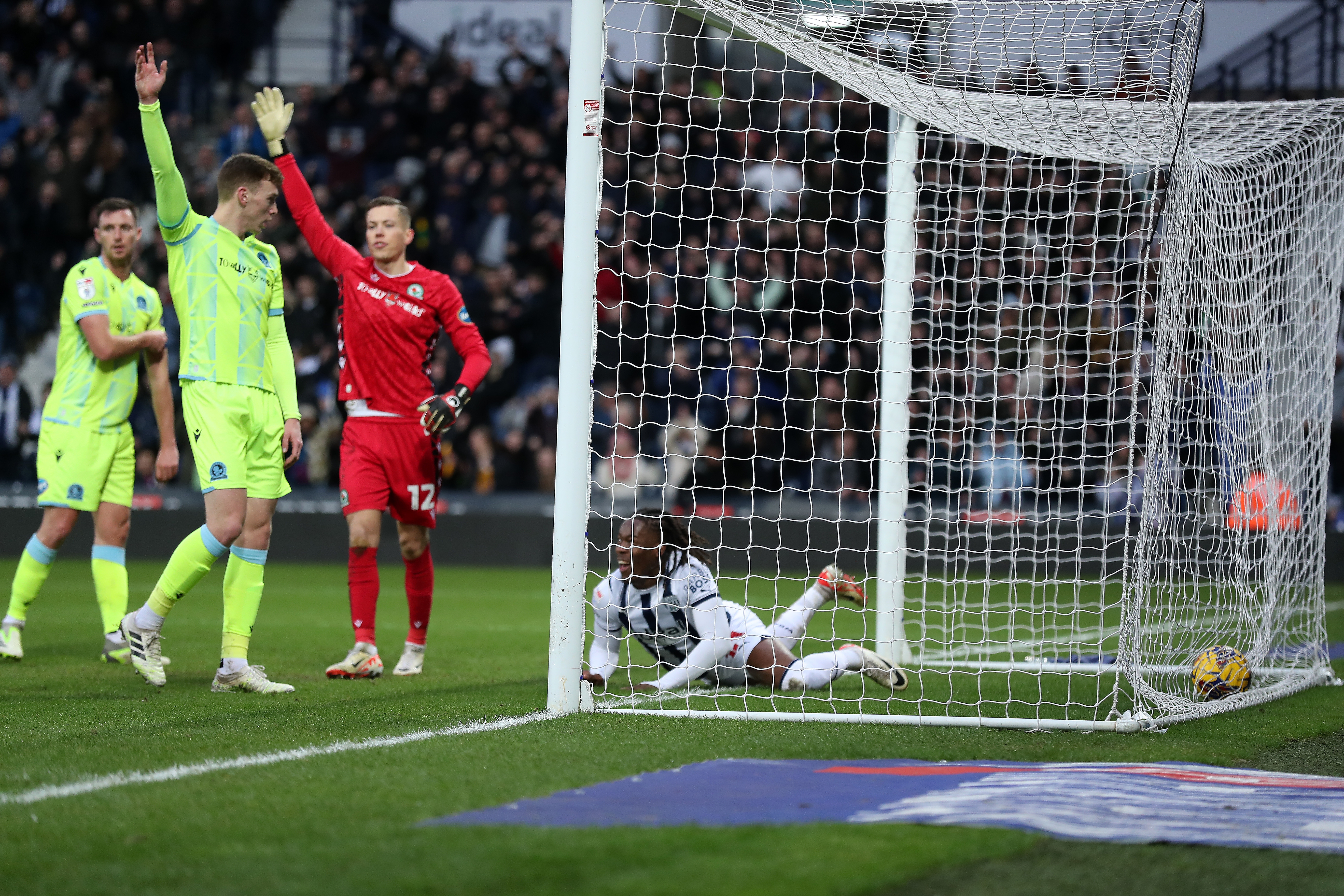 Brandon Thomas-Asante stretches for the ball on the goaline 