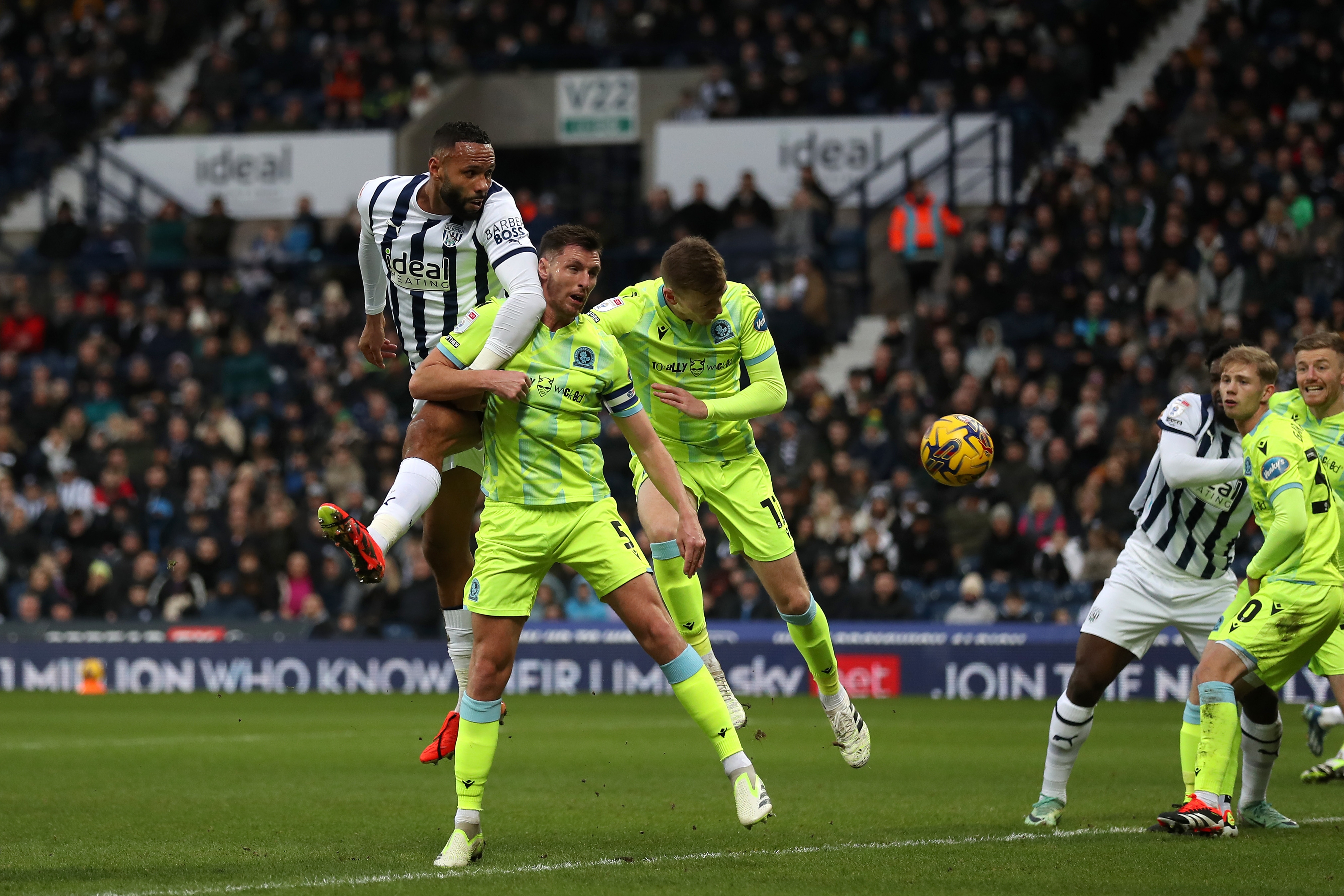 Kyle Bartley jumps for the ball against Blackburn 