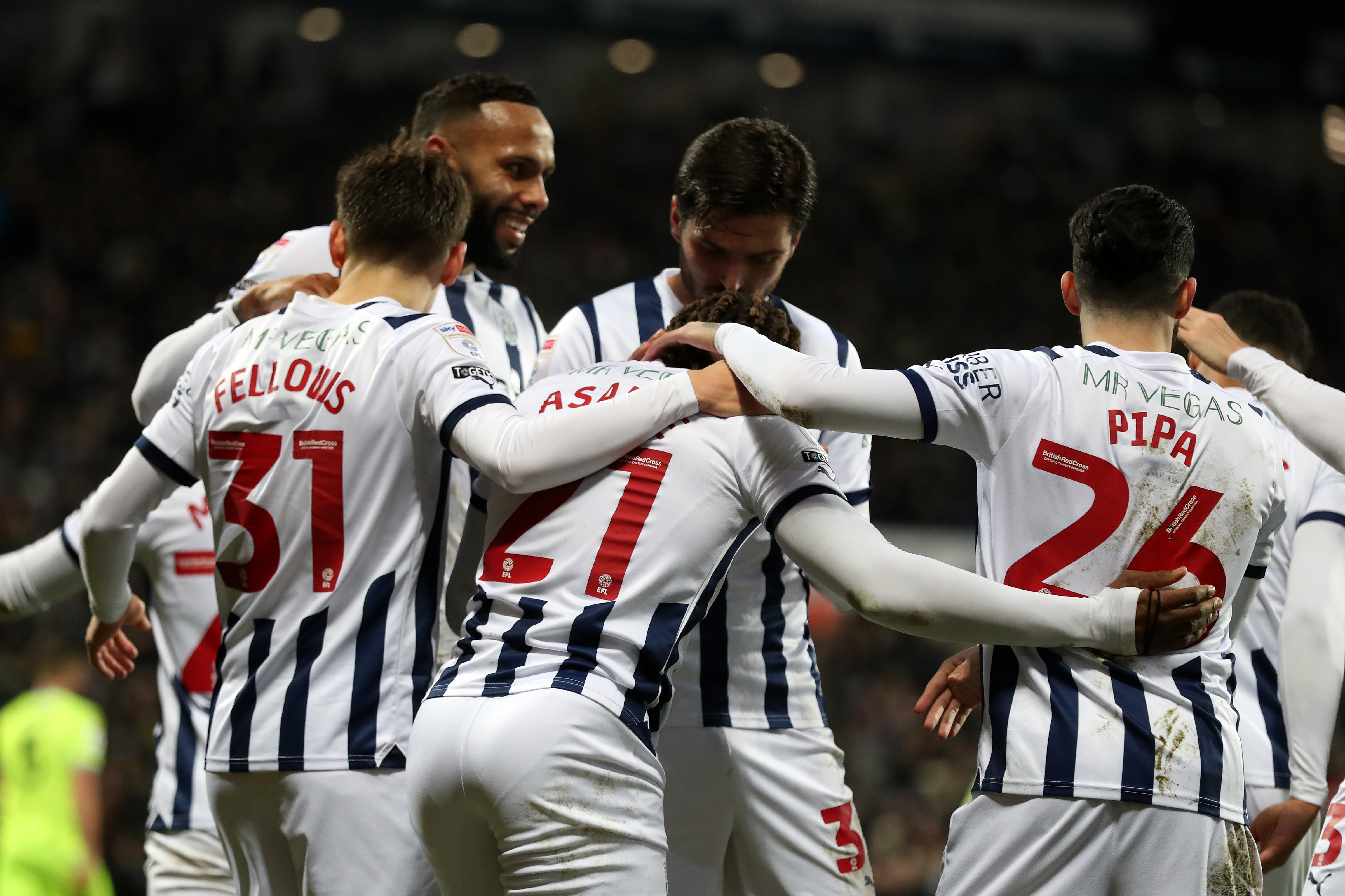 Brandon Thomas-Asante celebrates scoring his second against Blackburn with team-mates