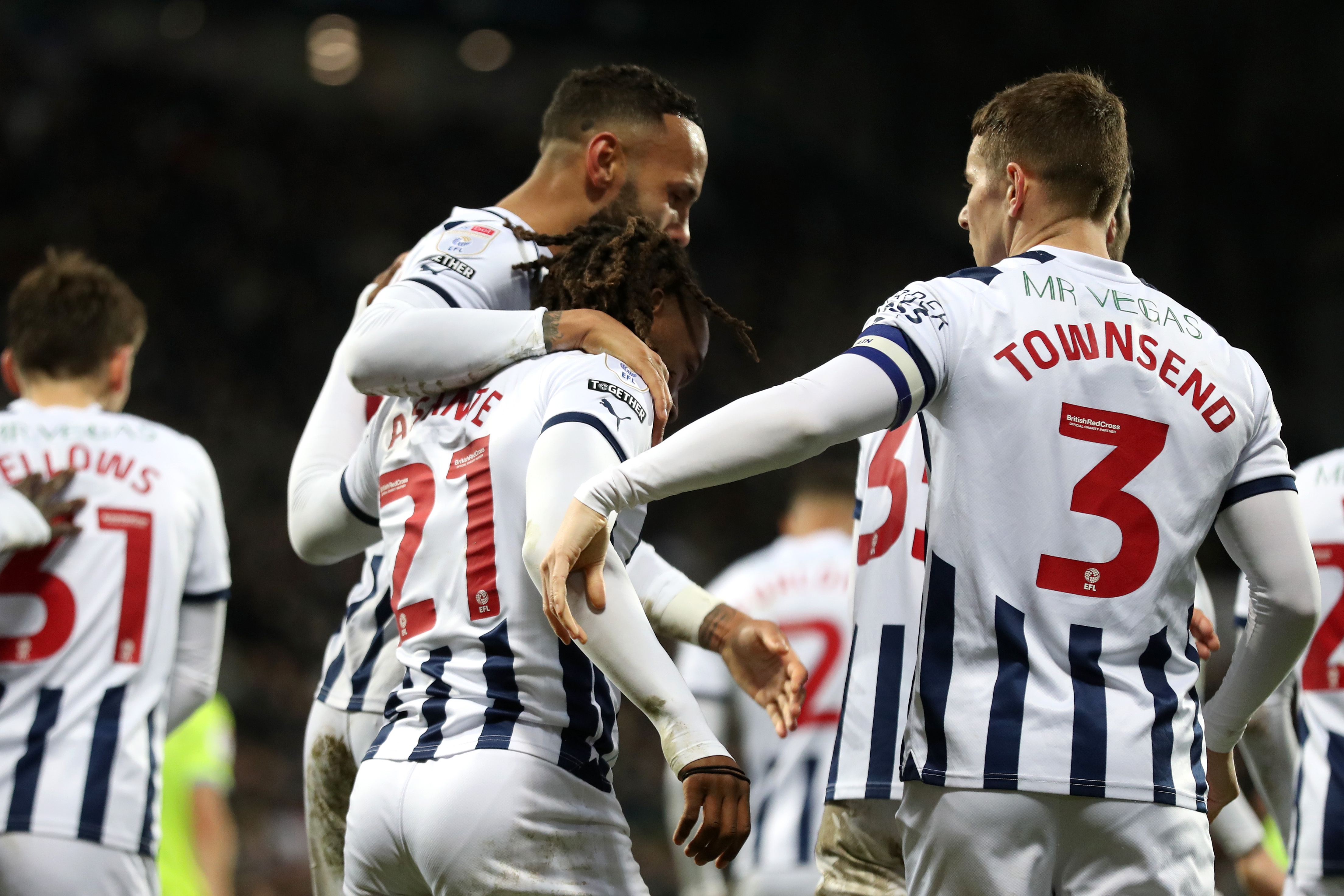 Brandon Thomas-Asante celebrates scoring his second against Blackburn with team-mates