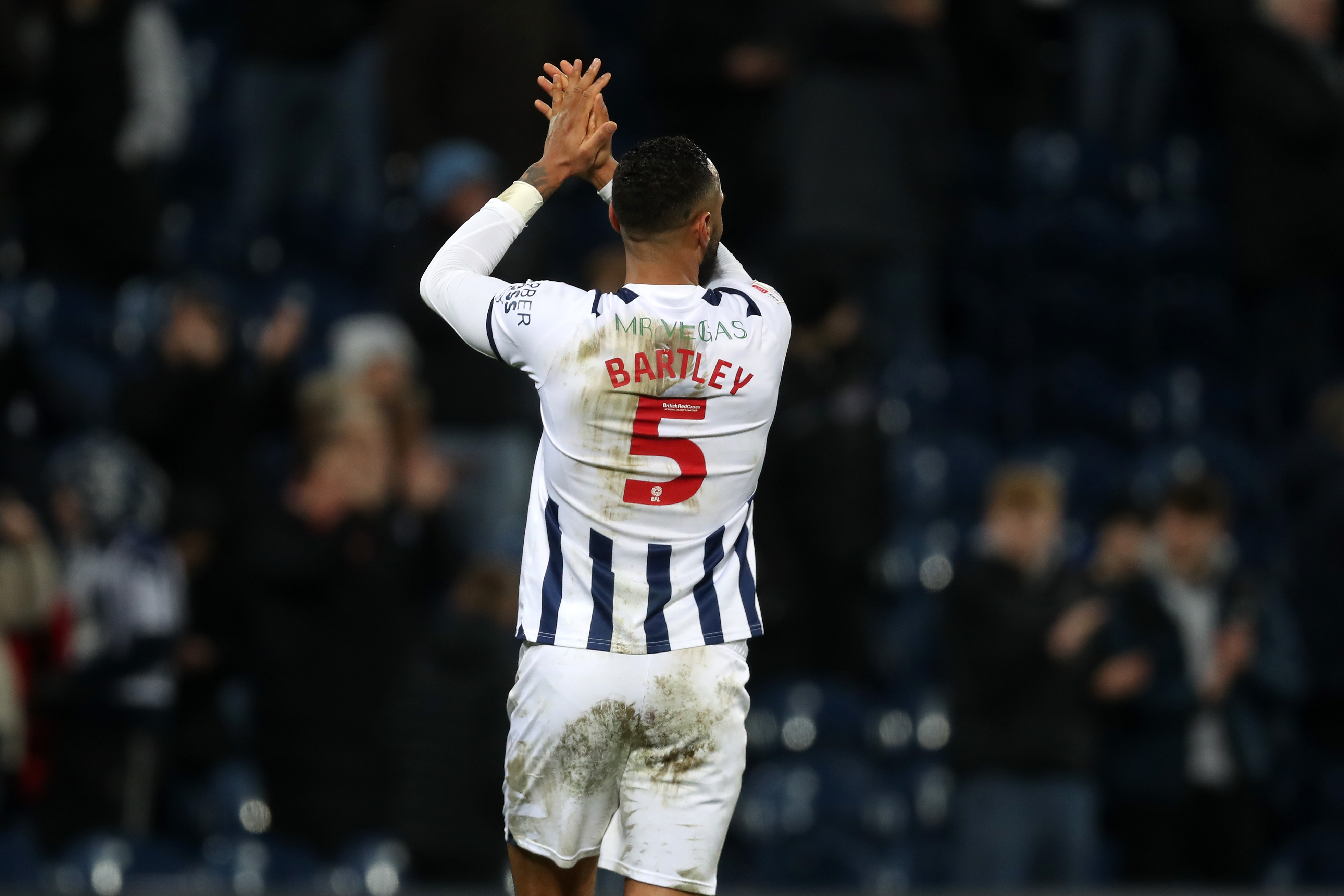 Kyle Bartley applauds supporters after full time against Blackburn