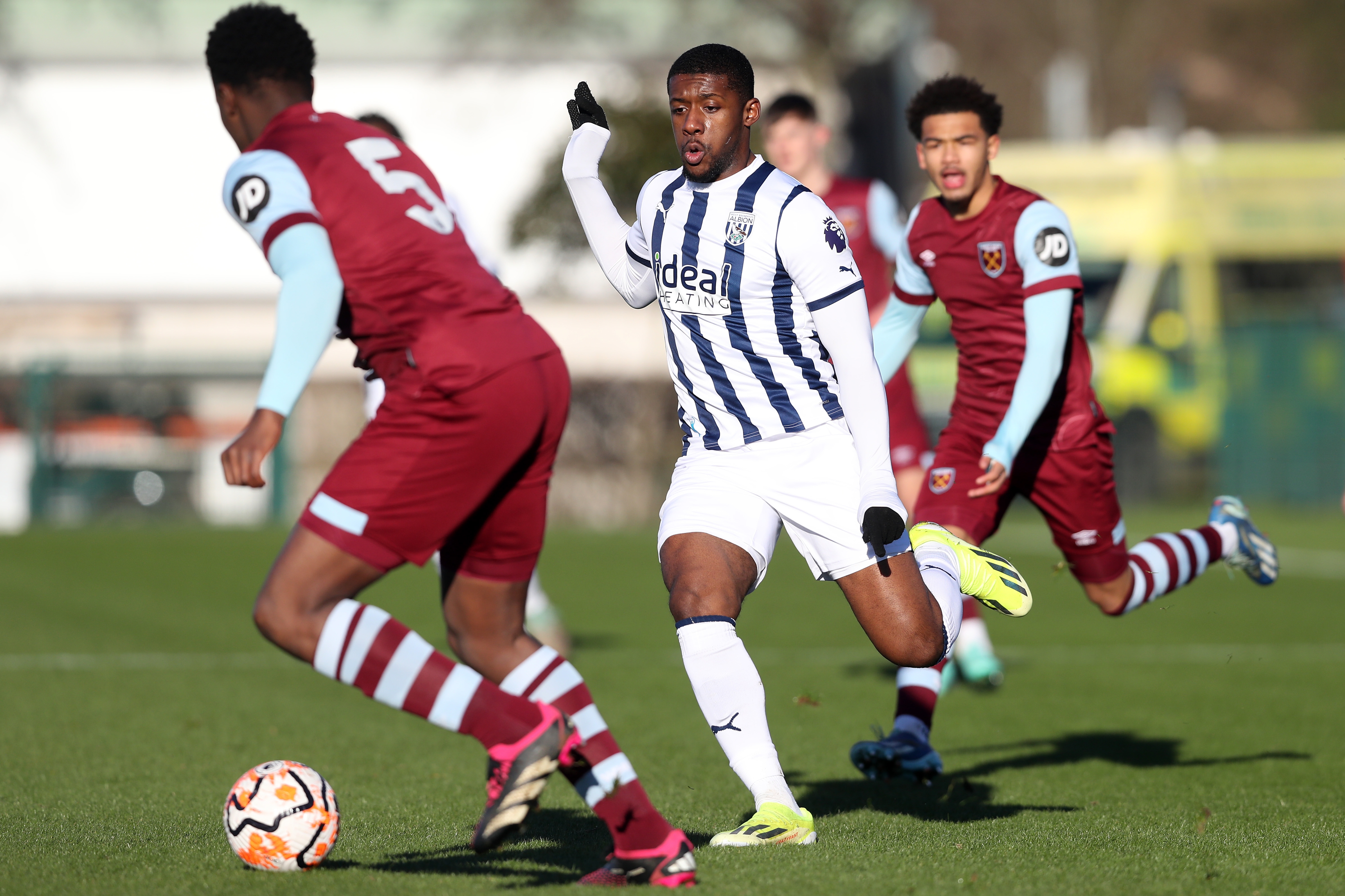 Jovan Malcolm chases down the ball against West Ham's PL2 team
