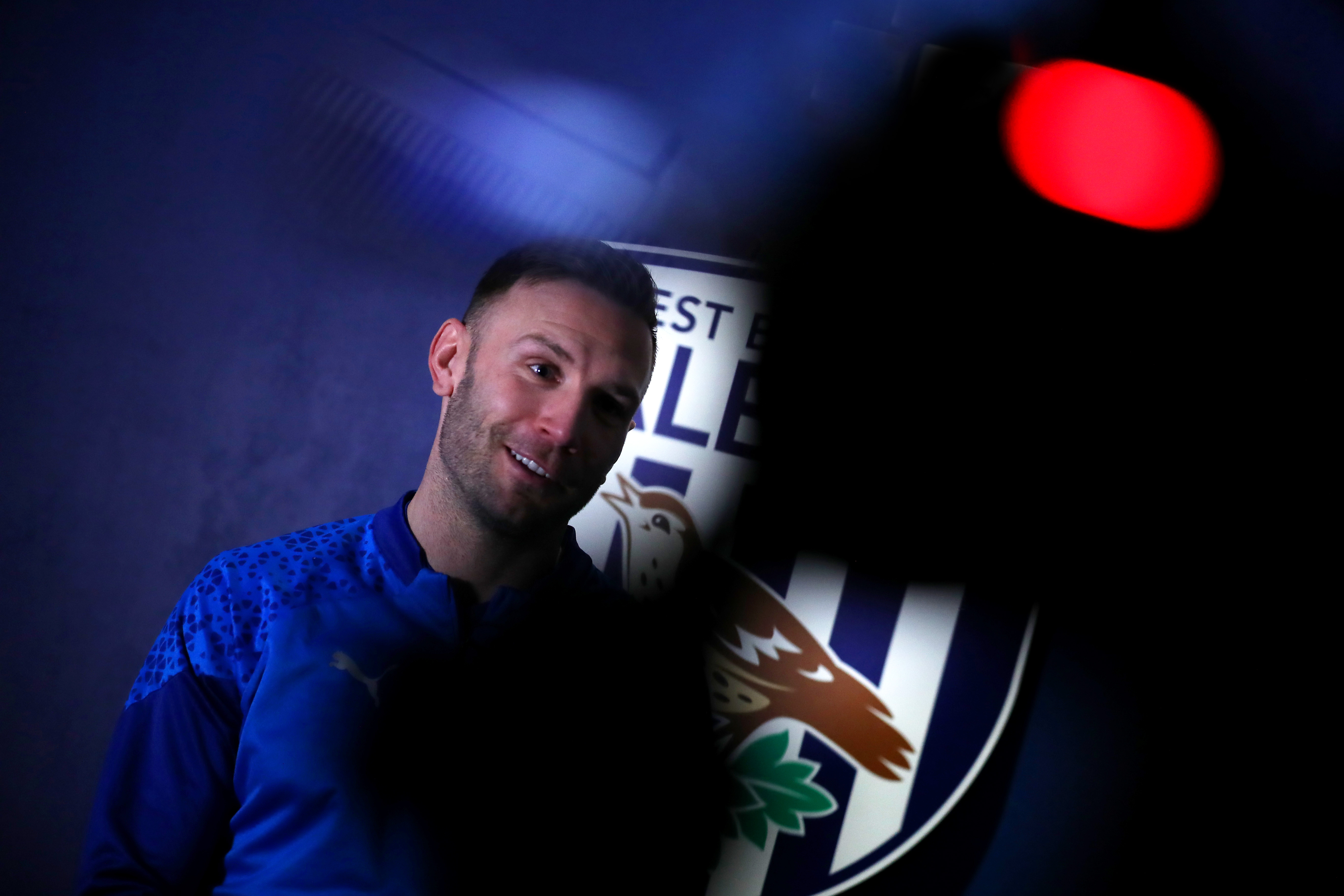 Andi Weimann smiling while talking to WBA TV