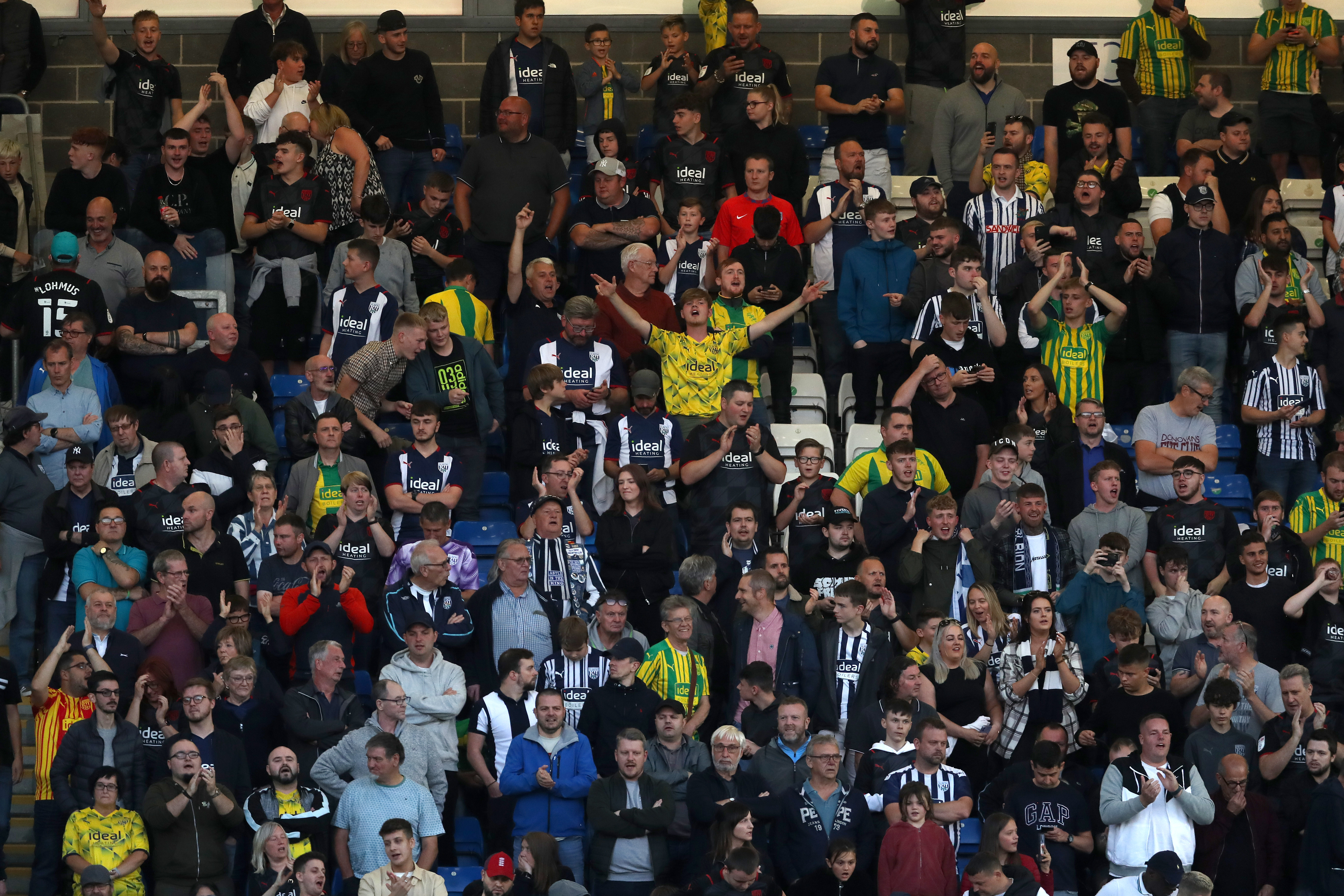 A general view of Albion fans cheering at a game