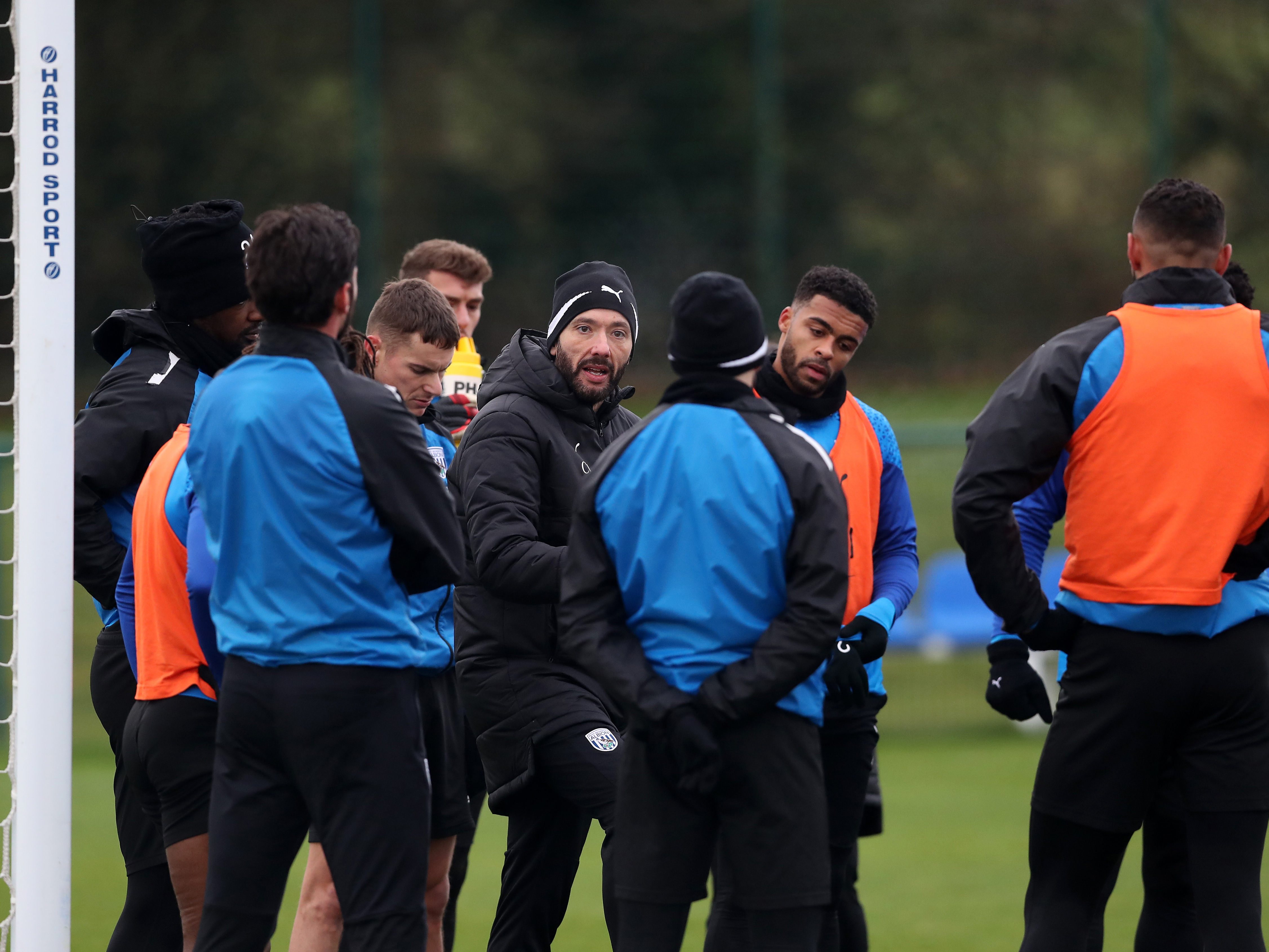 An image of Carlos Corberan talking to his players