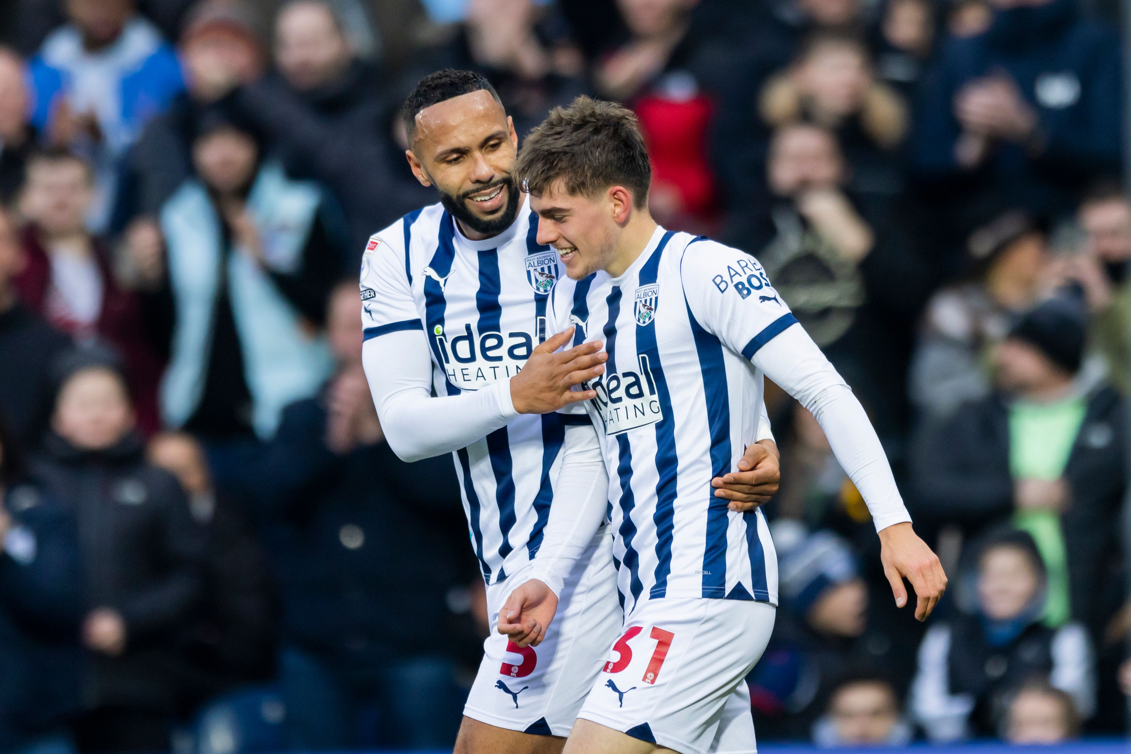 Kyle Bartley celebrates with Tom Fellows after his Blackburn goal