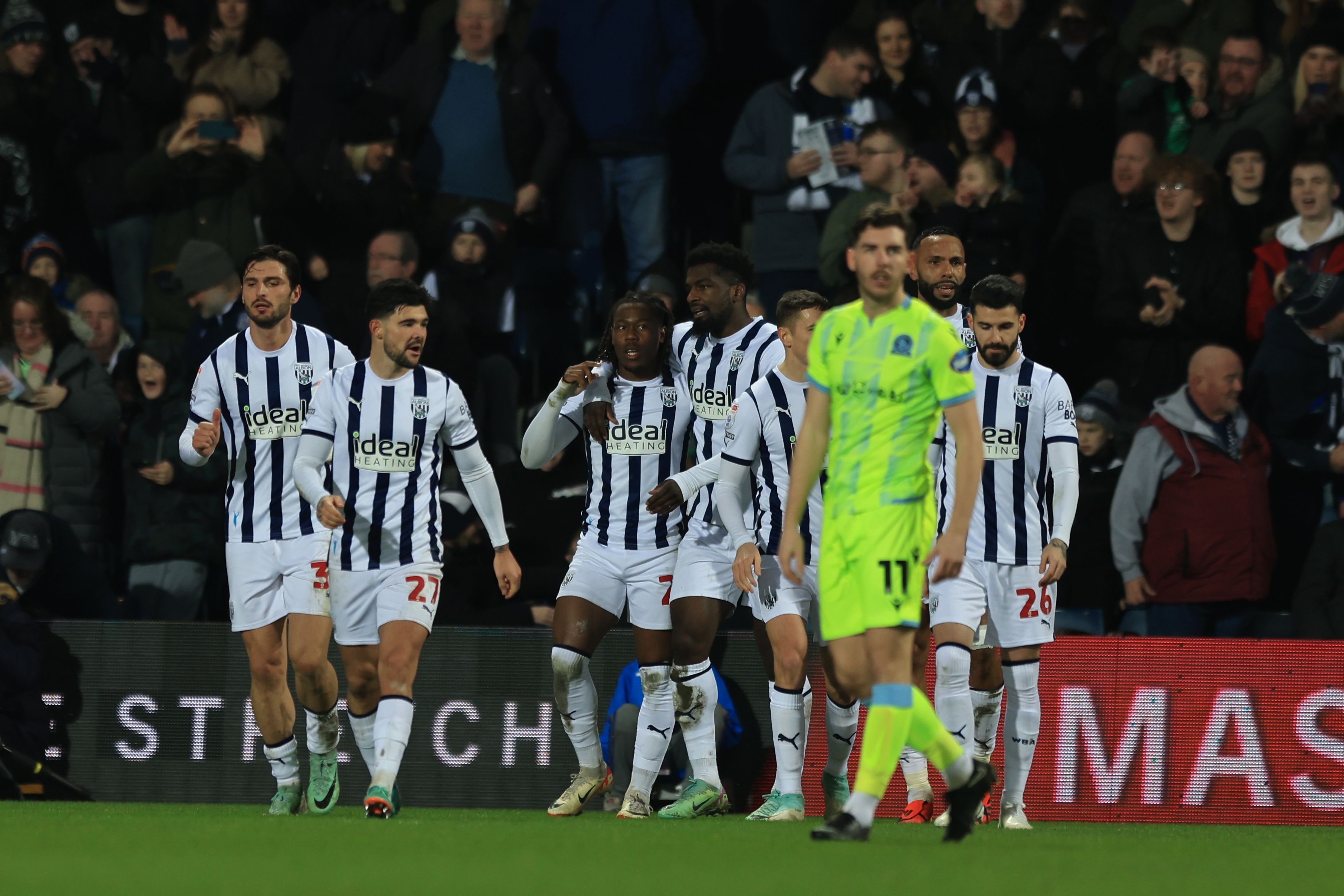 Brandon Thomas-Asante celebrates scoring his second against Blackburn with team-mates