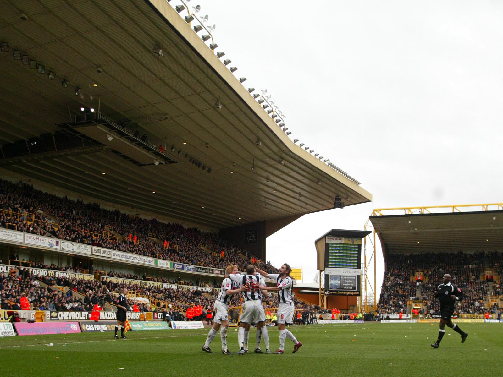 Albion players celebrate one of their three goals at Molineux in the FA Cup in 2007