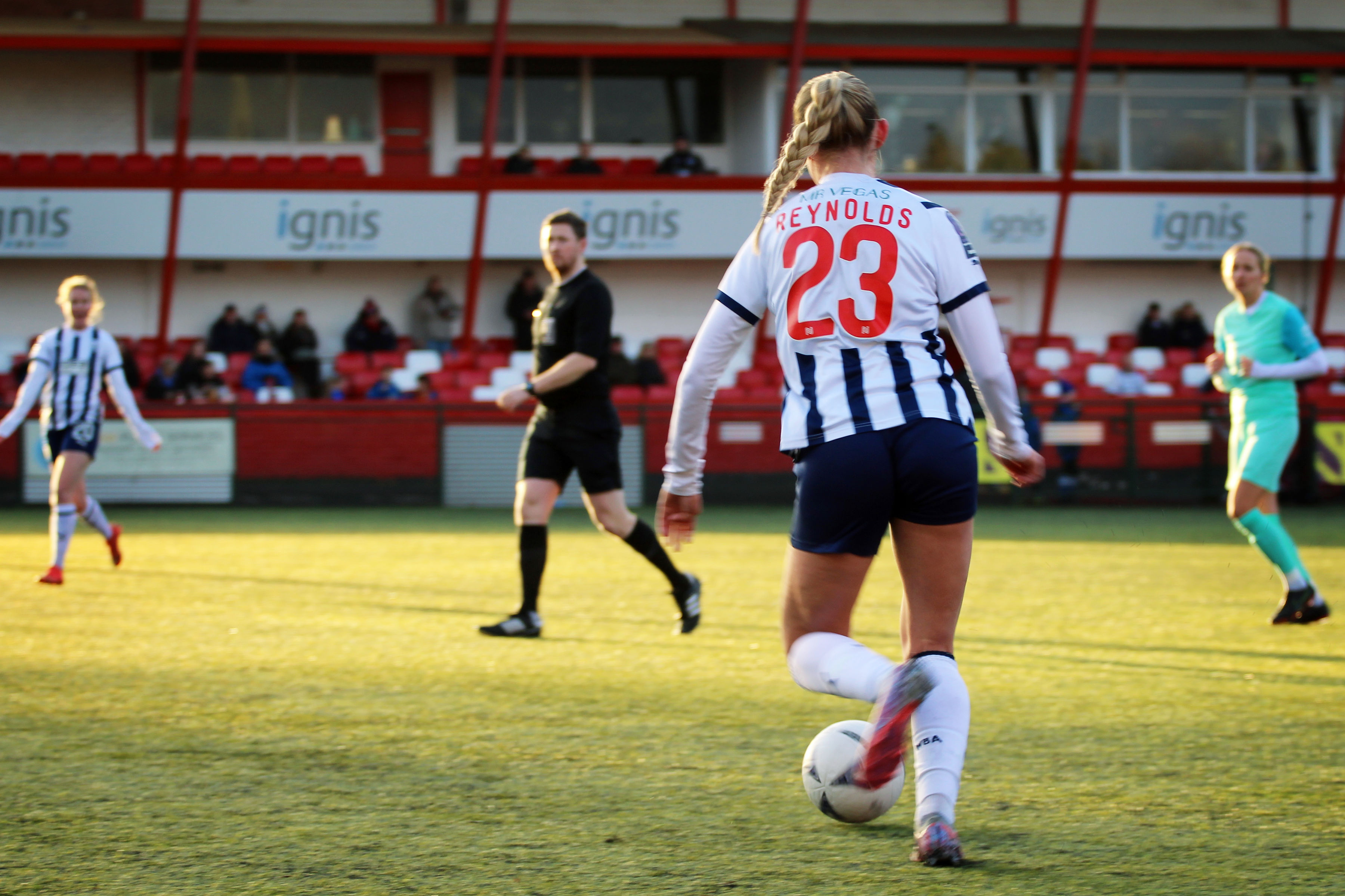 Taylor Reynolds in action for Albion Women, in home colours.