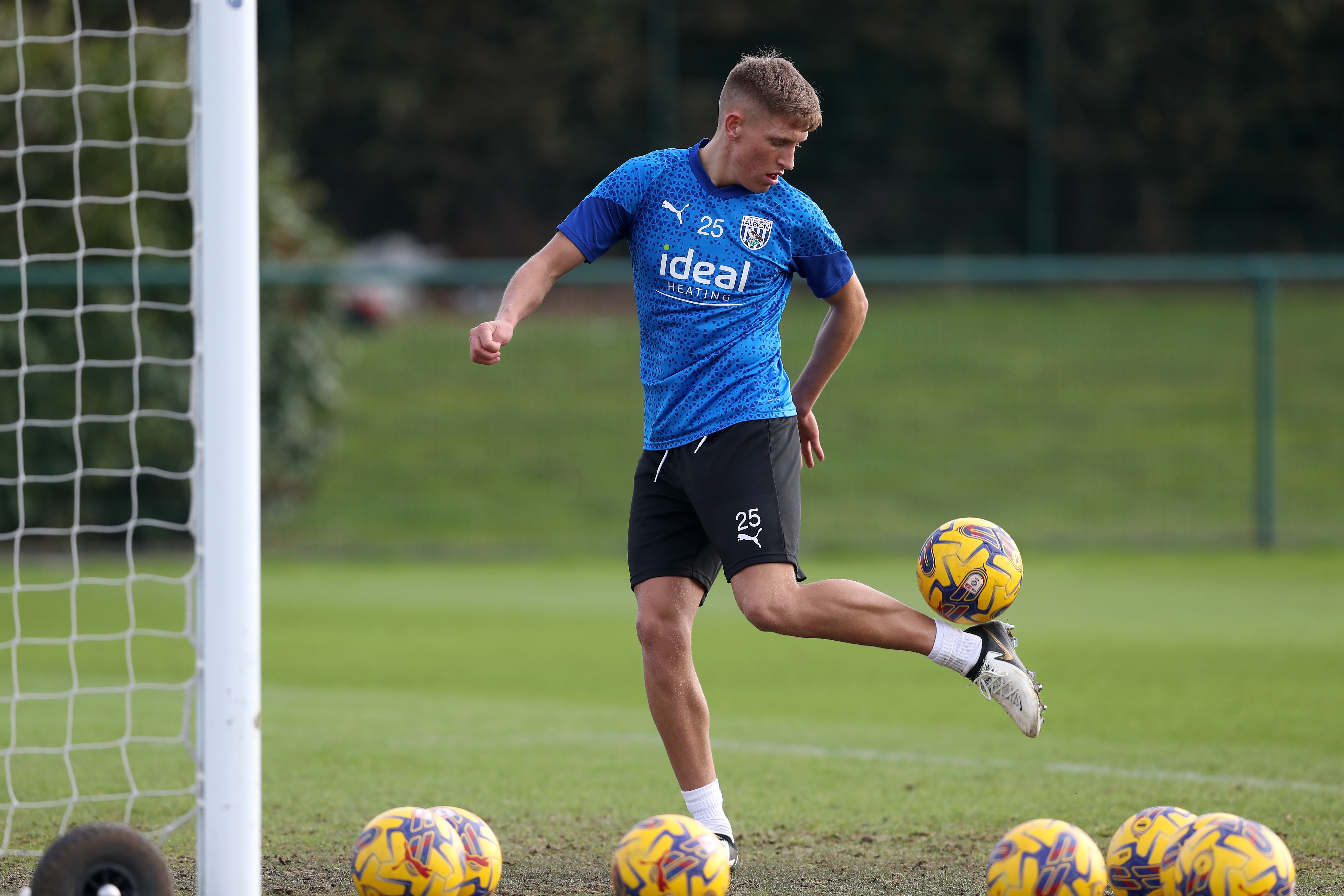 Callum Marshall flicking a ball up during a training session