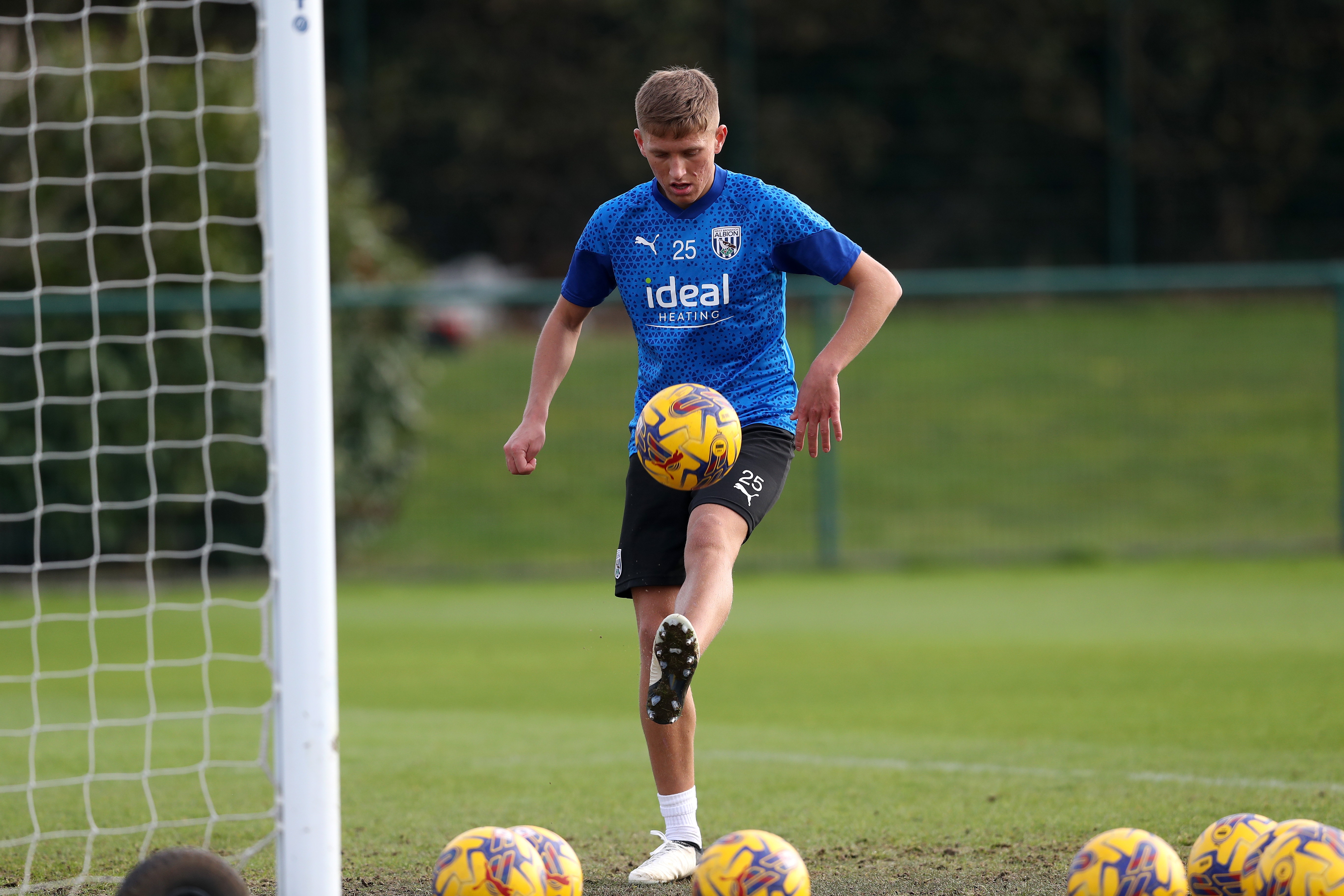 Callum Marshall flicking a ball up during a training session