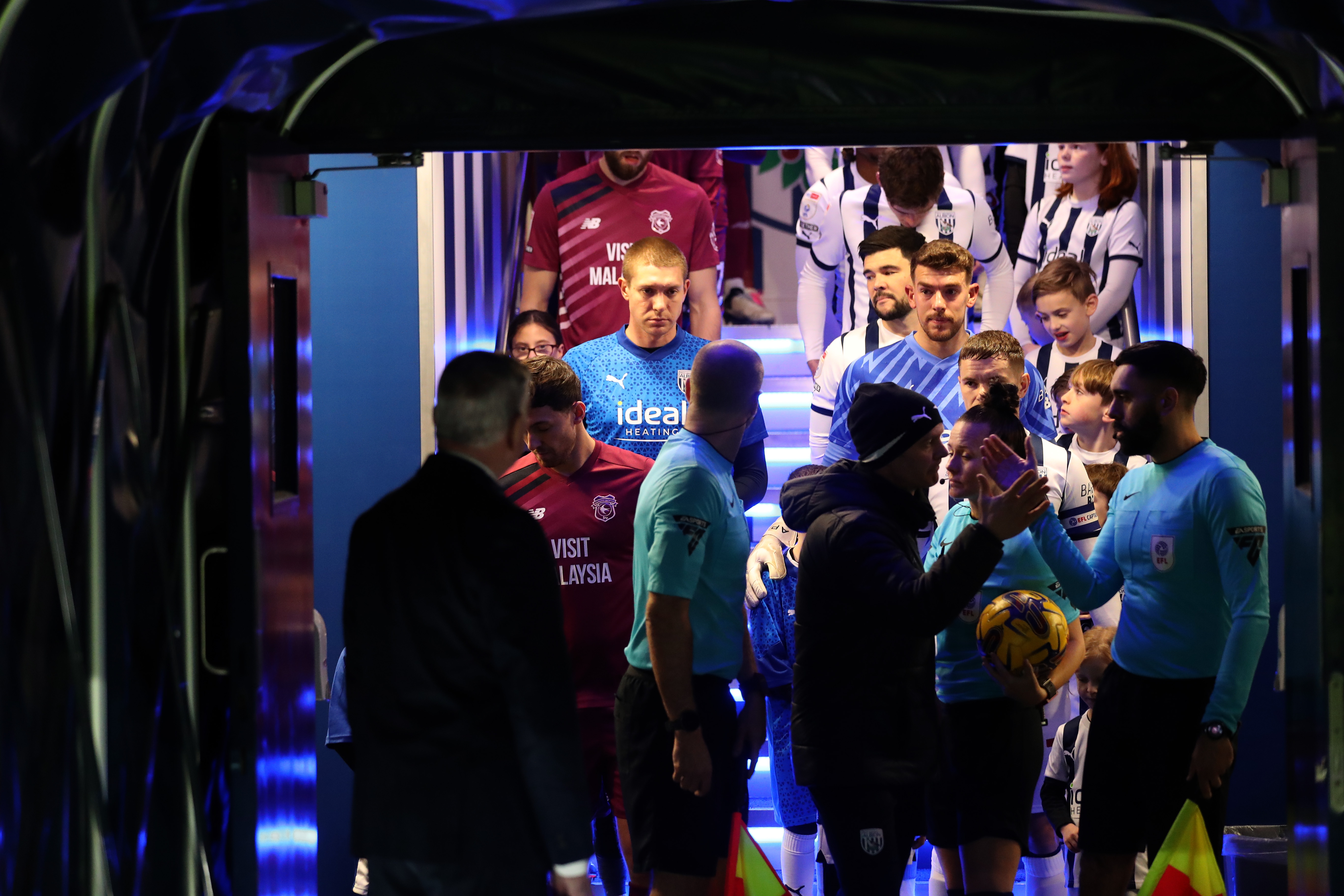 Albion and Cardiff players waiting in the tunnel before the game 