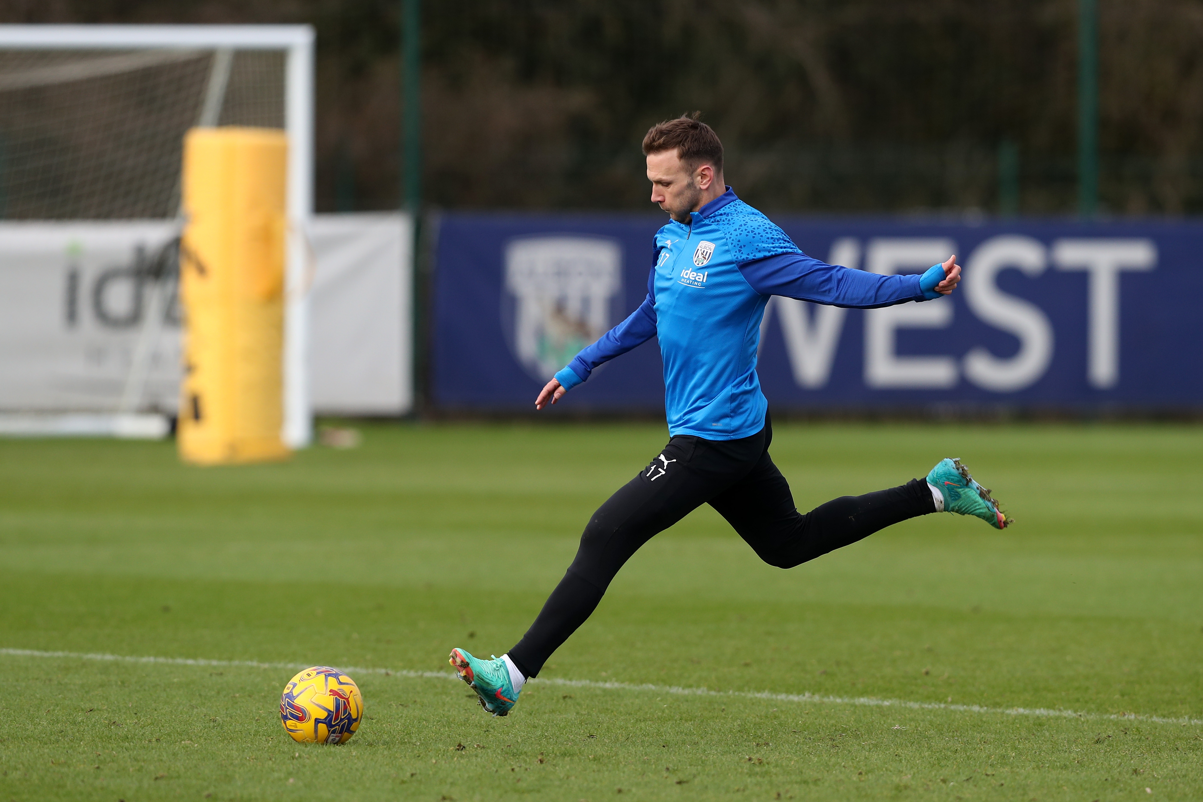 Andi Weimann striking a ball during a training session
