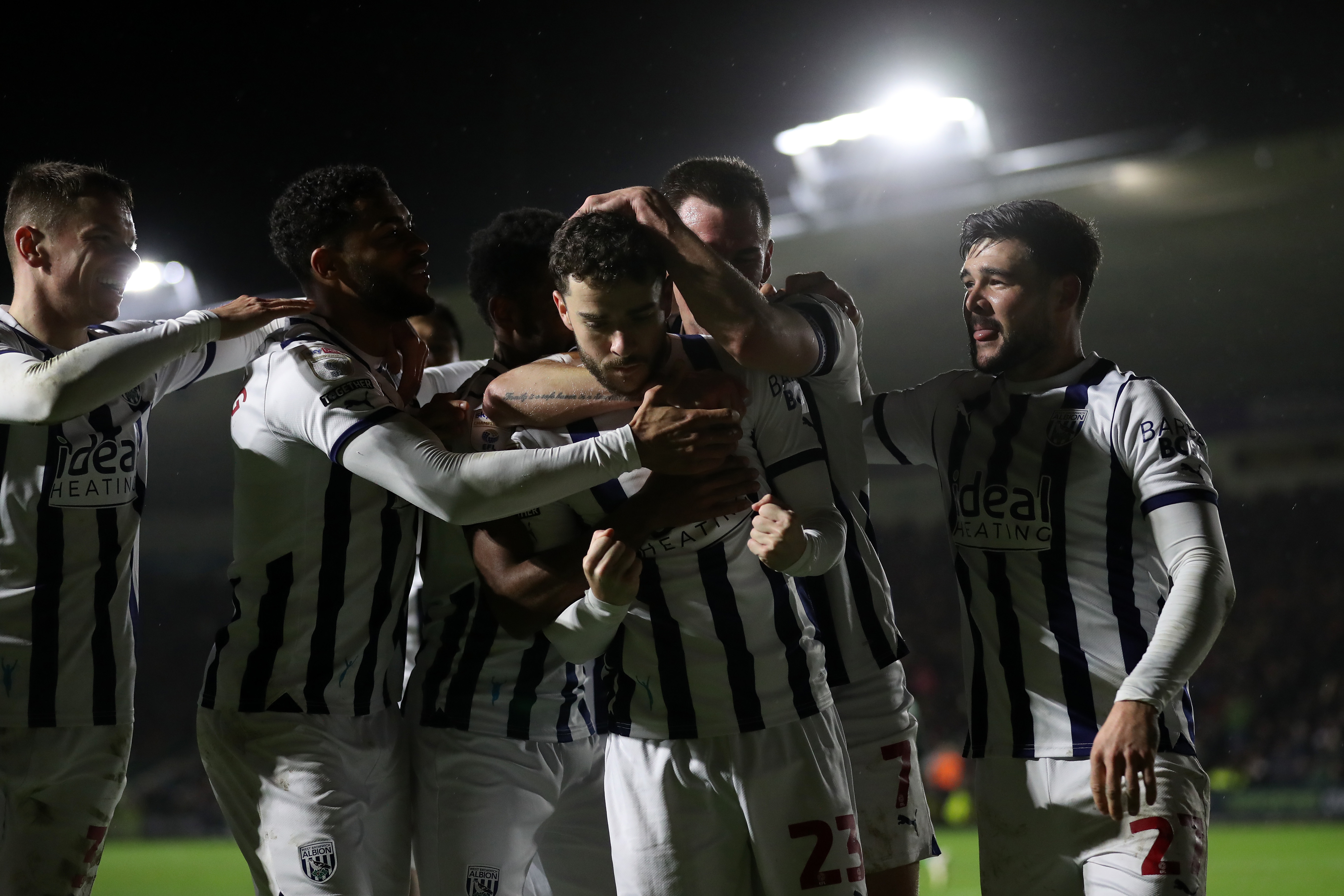 Mikey Johnston celebrates scoring against Plymouth with several team-mates