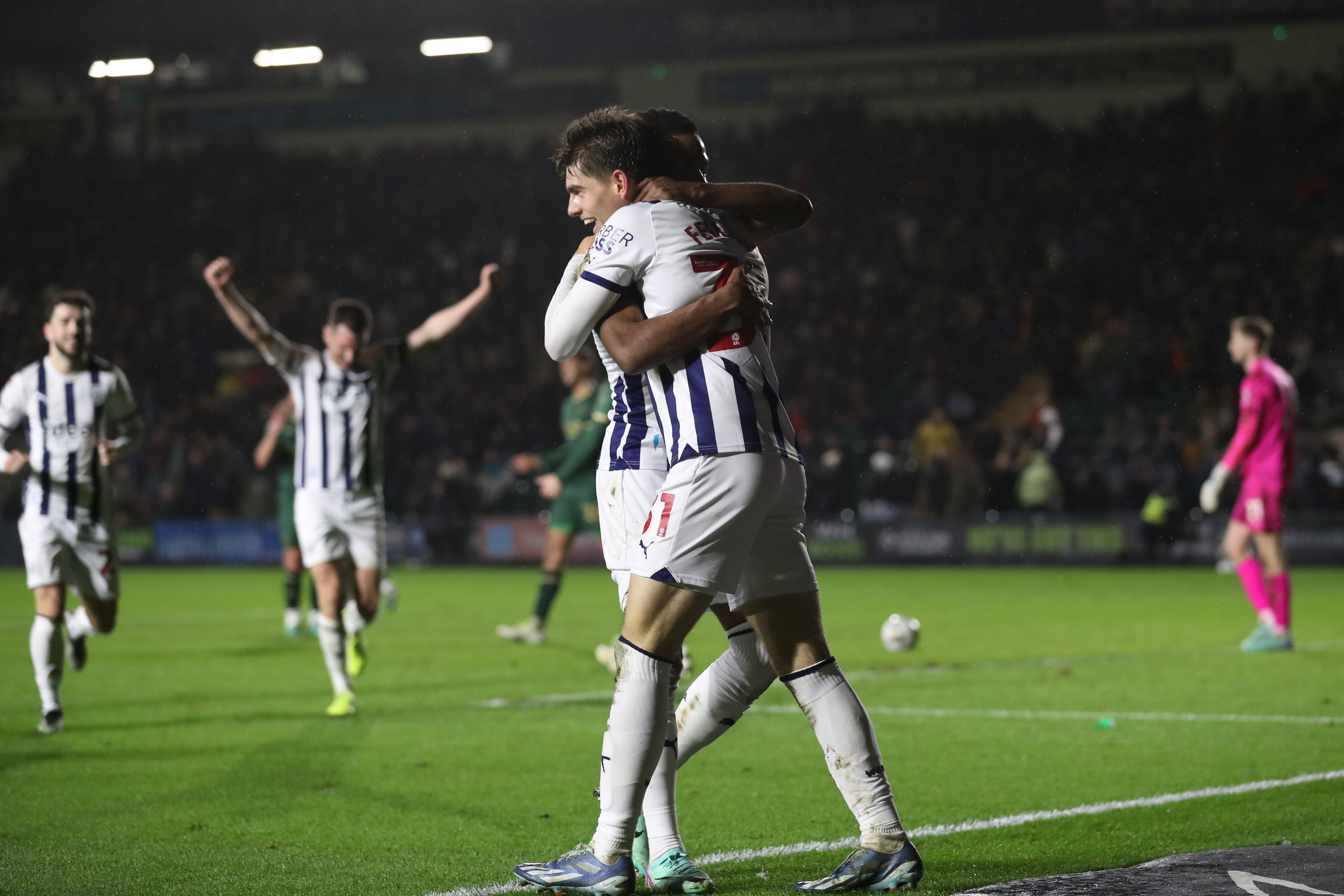Tom Fellows celebrates scoring against Plymouth with Grady Diangana