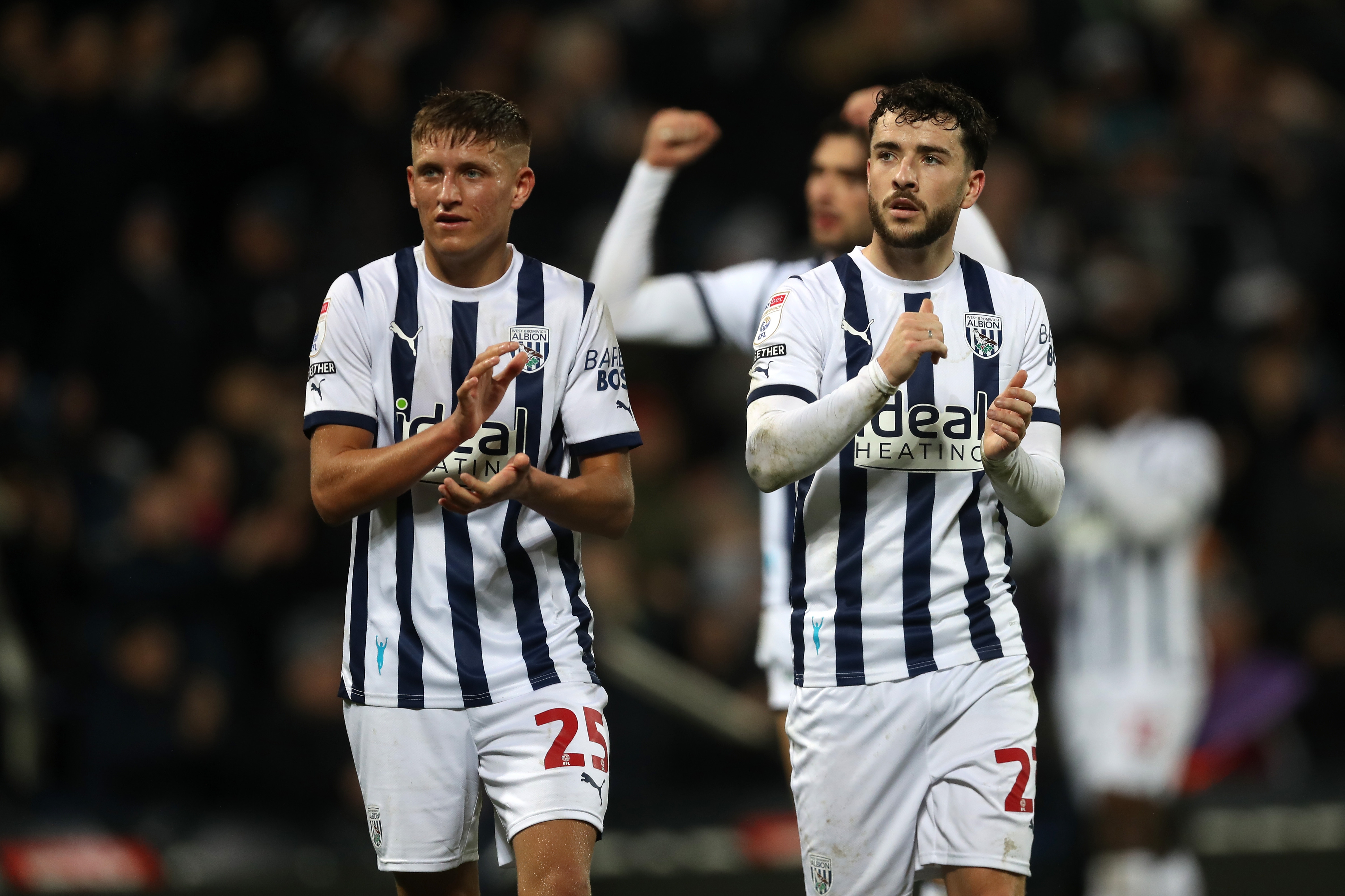 Callum Marshall and Mikey Johnston applaud Albion fans after beating Blues