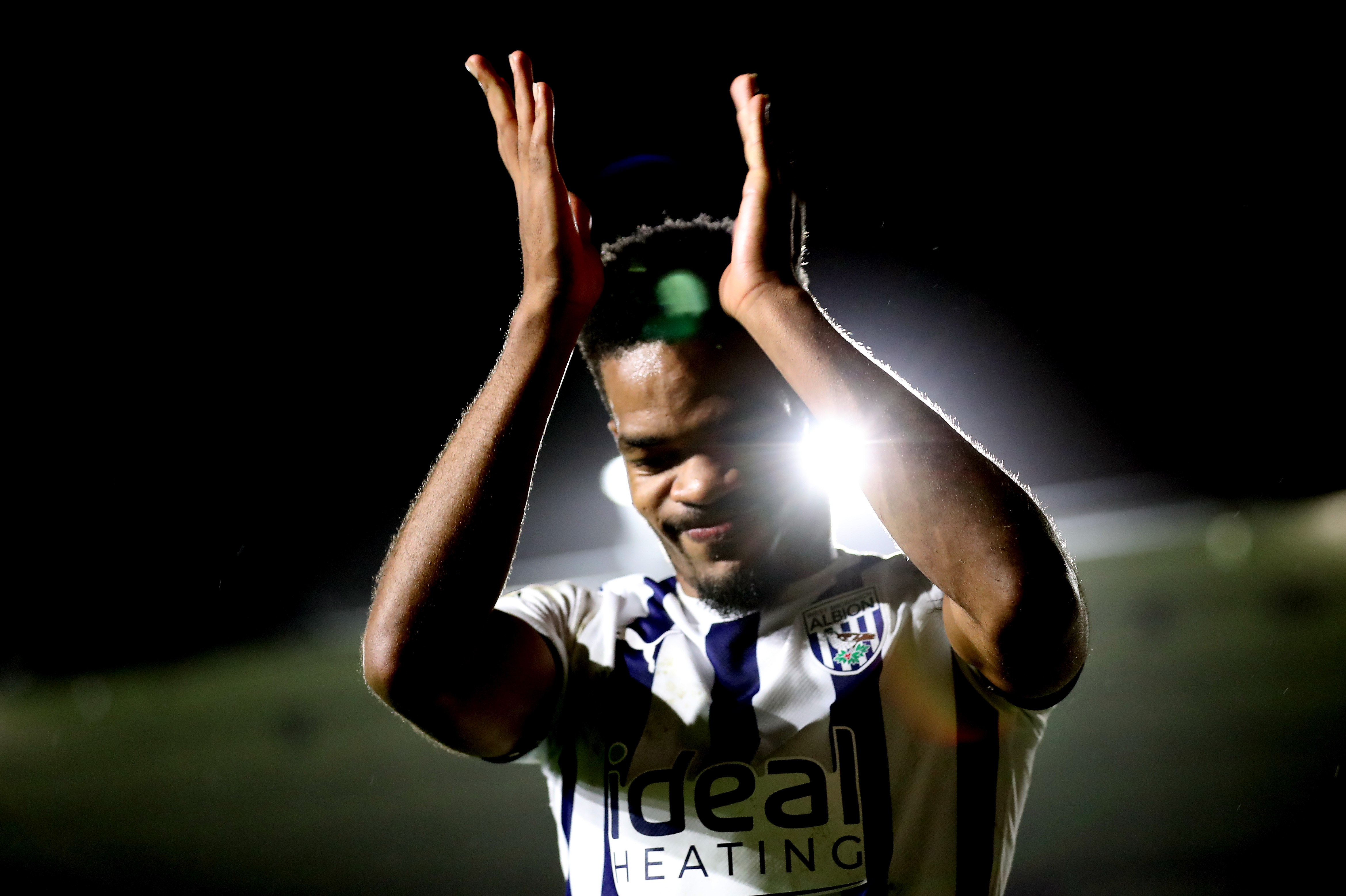 Grady Diangana applauds Albion fans after the full-time whistle at Plymouth