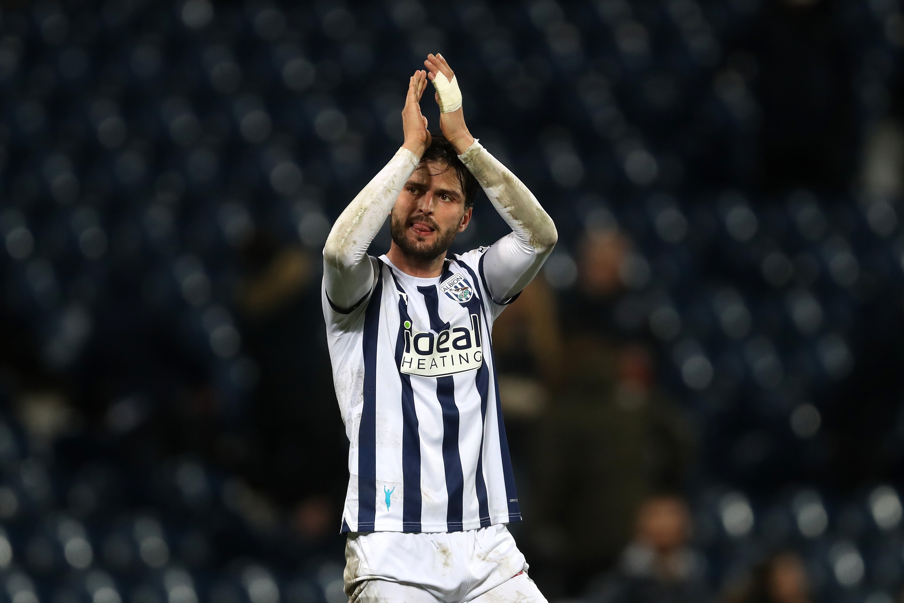 Okay Yokuslu applauds Albion fans after beating Cardiff 