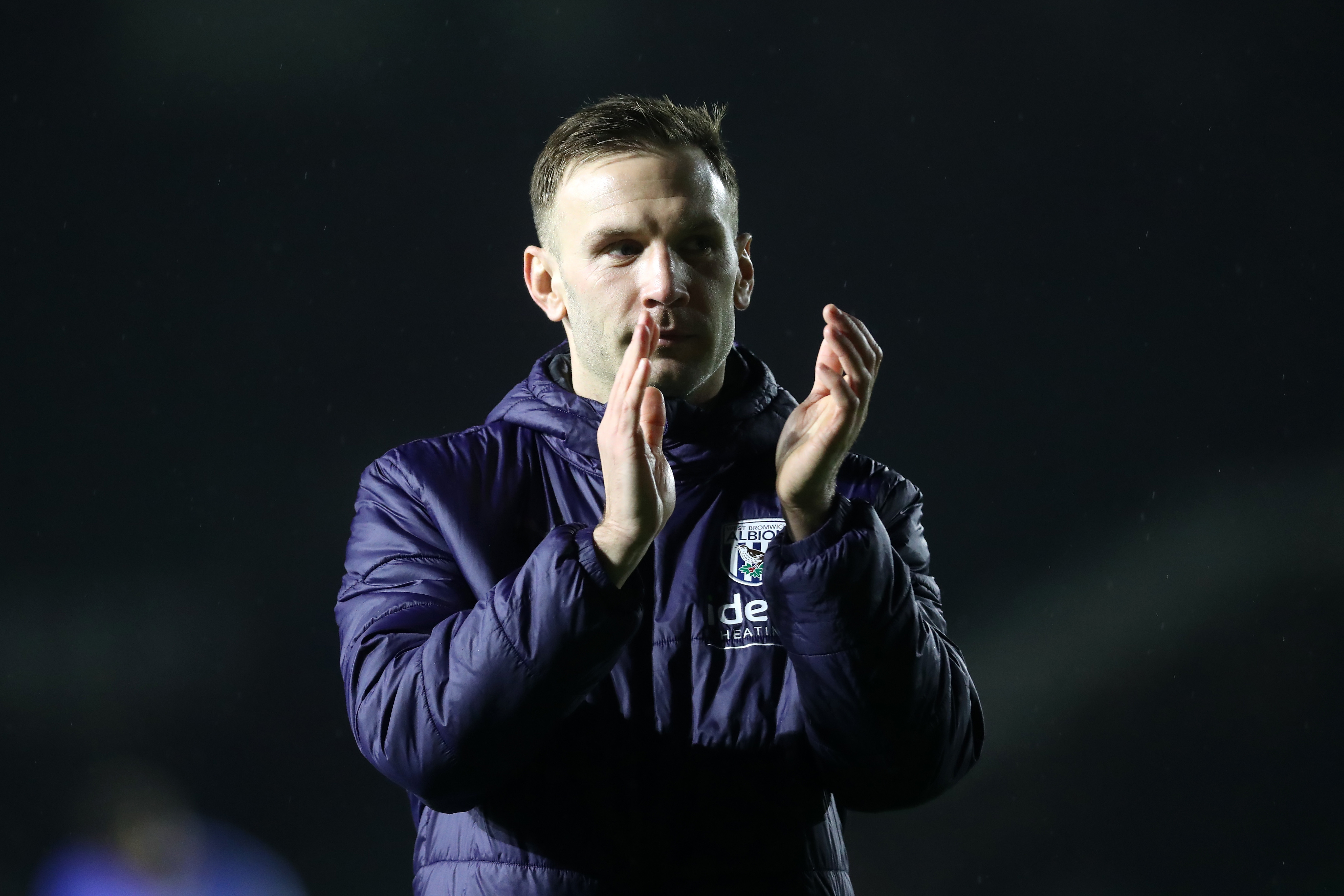 Andi Weimann applauds Albion fans after the full-time whistle at Plymouth