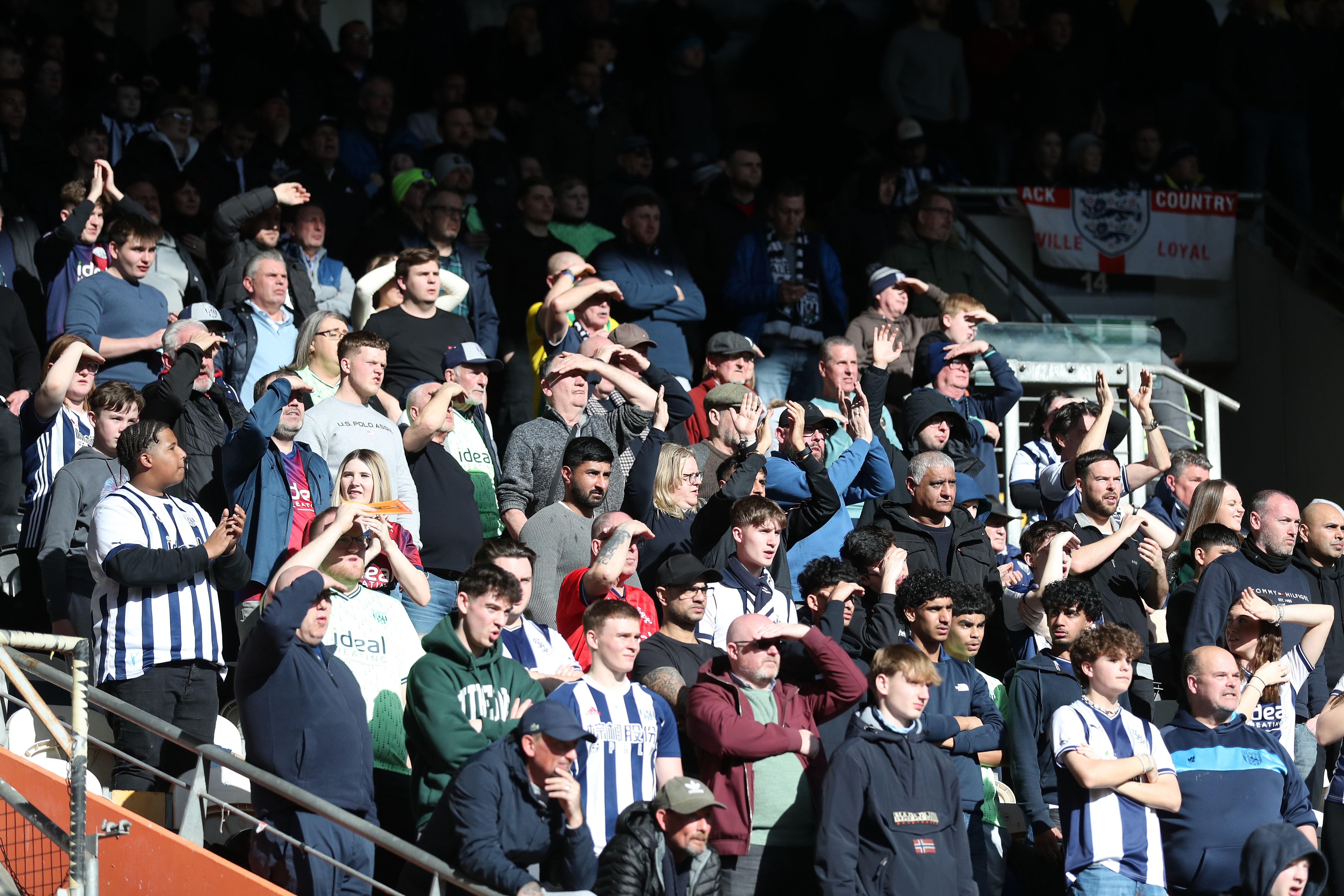 A general view of Albion fans in the away end at the MKM Stadium