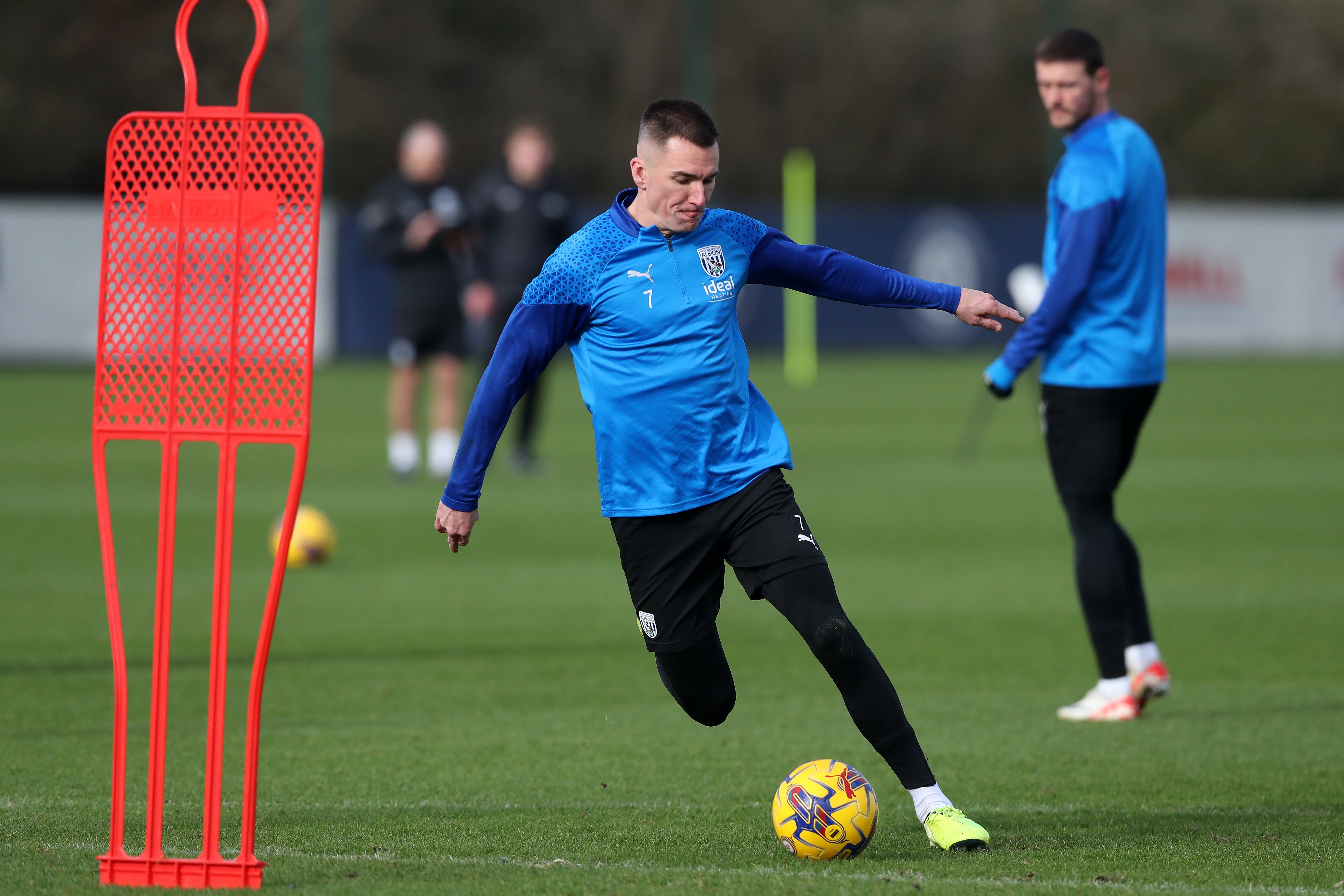Jed Wallace shoots at goal during training