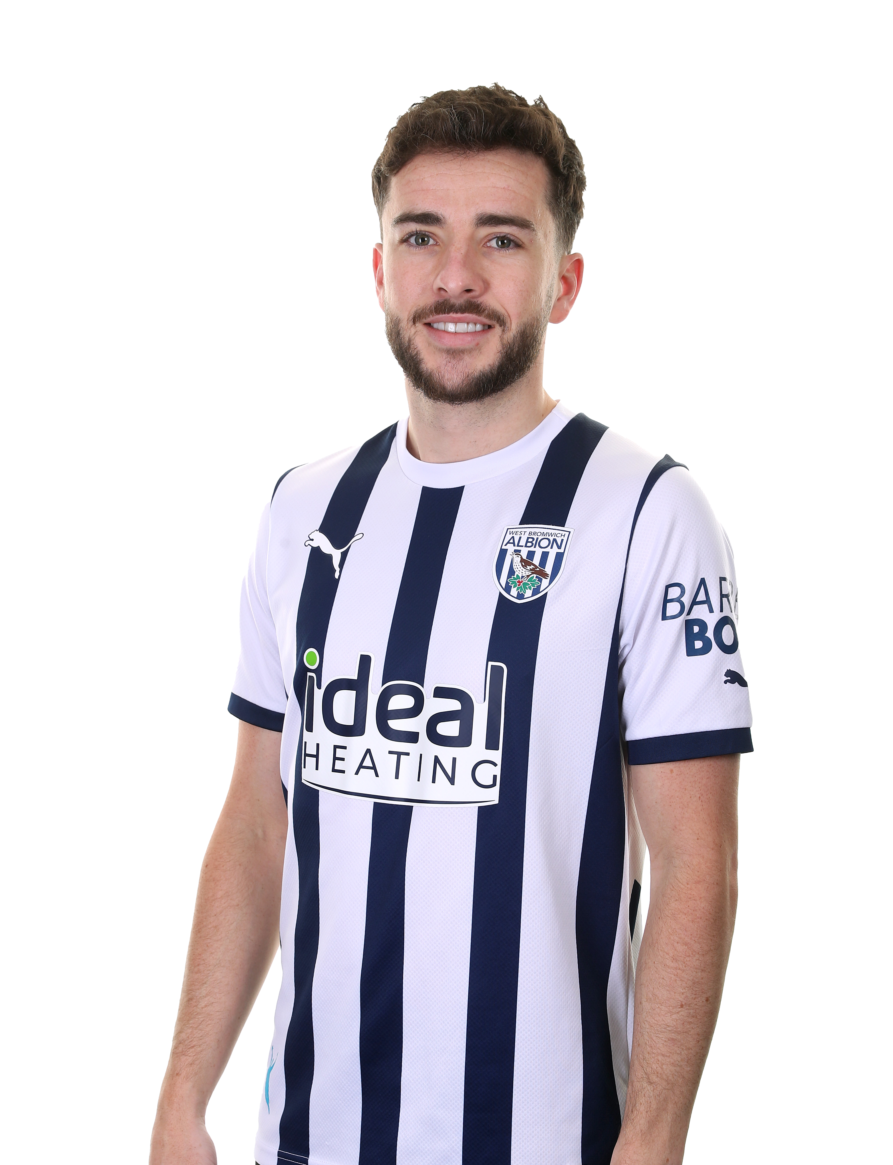 A photo headshot of Mikey Johnston in Albion's 23/24 home kit