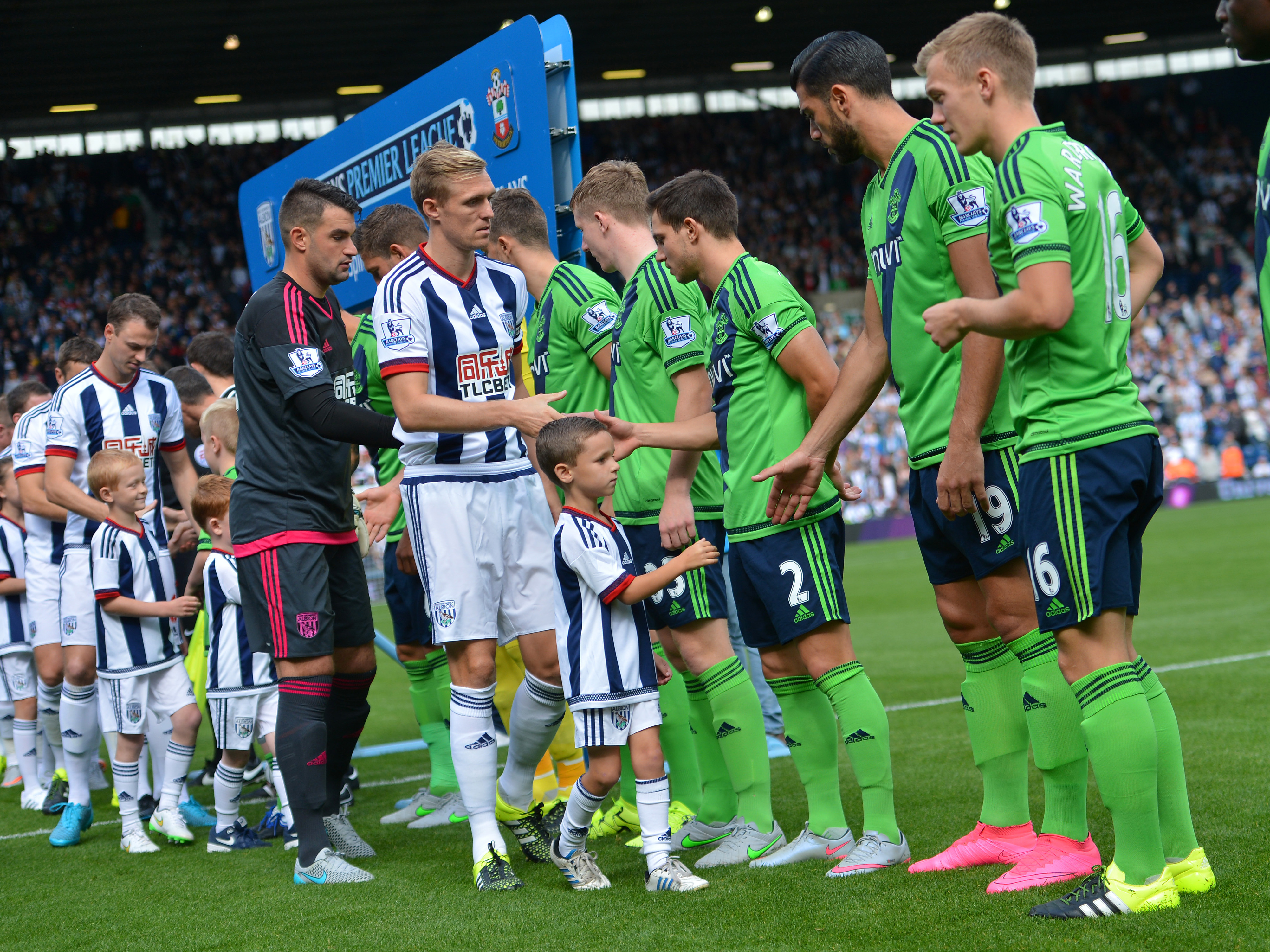 Albion players shake hands with Southampton players ahead of the Premier League match at The Hawthorns in September 2015