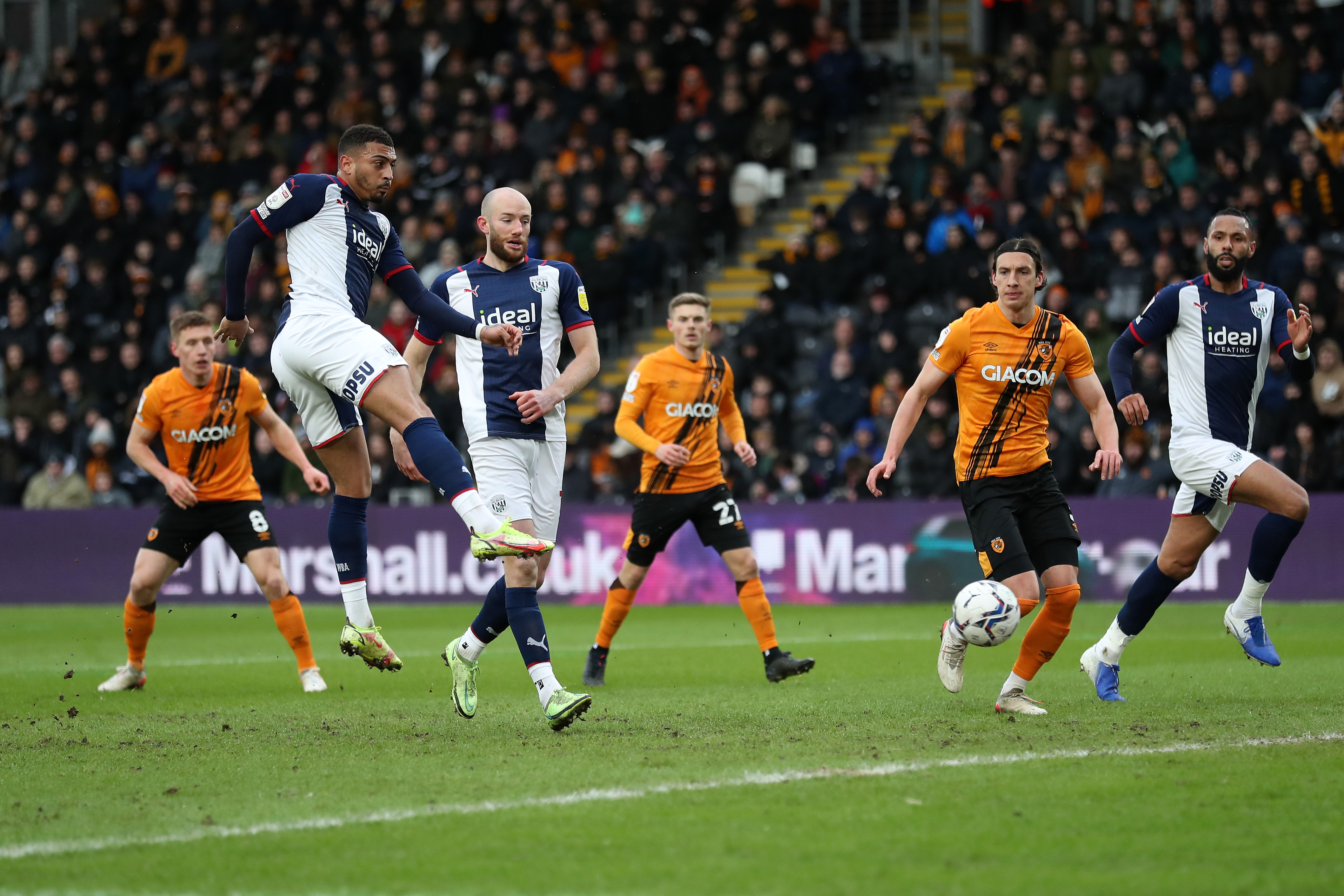 Karlan Grant scores a goal against Hull in March 2022