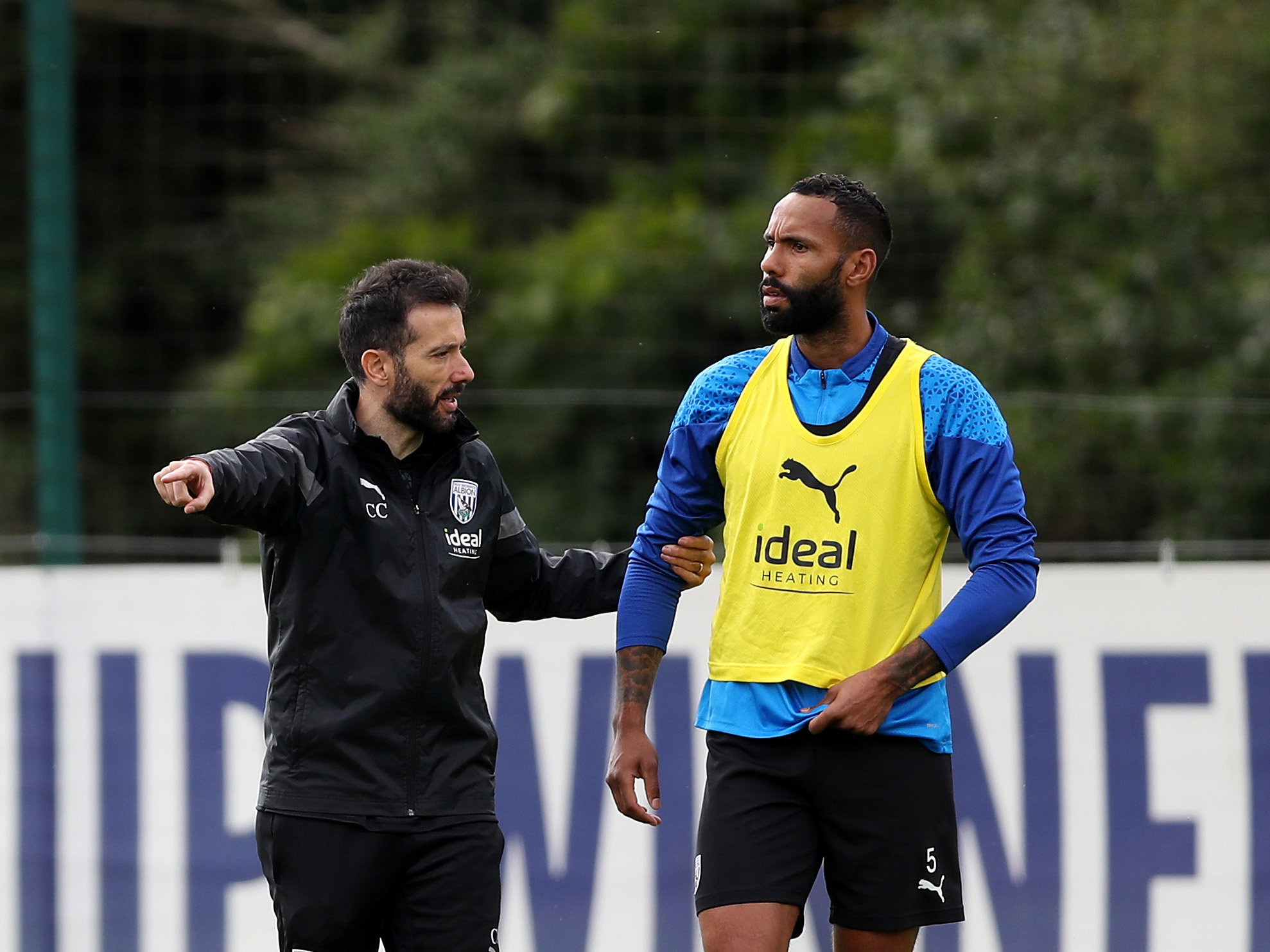 Carlos Corberán coaching Kyle Bartley out on the training pitch