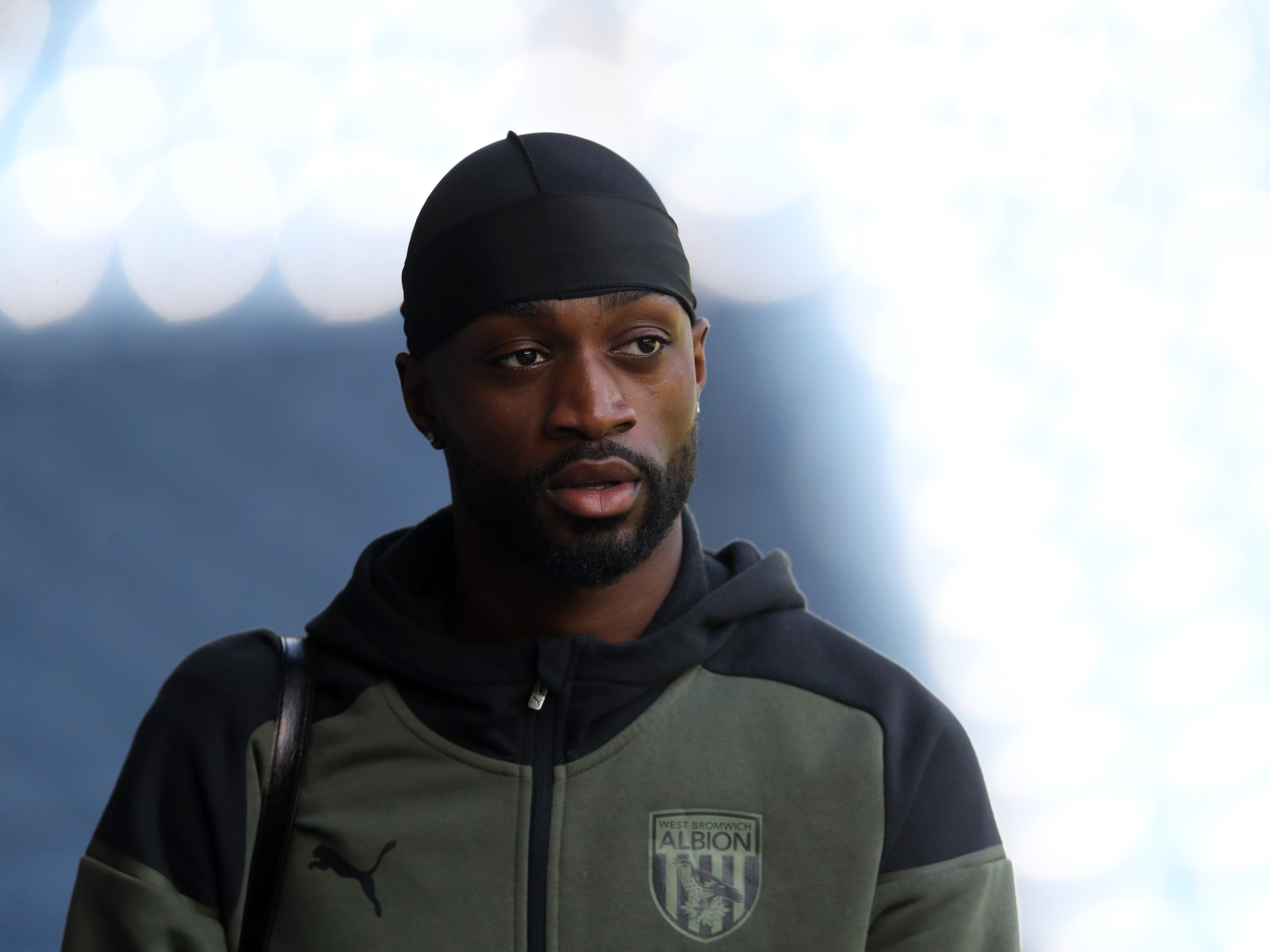 Semi Ajayi in an Albion tracksuit at The Hawthorns