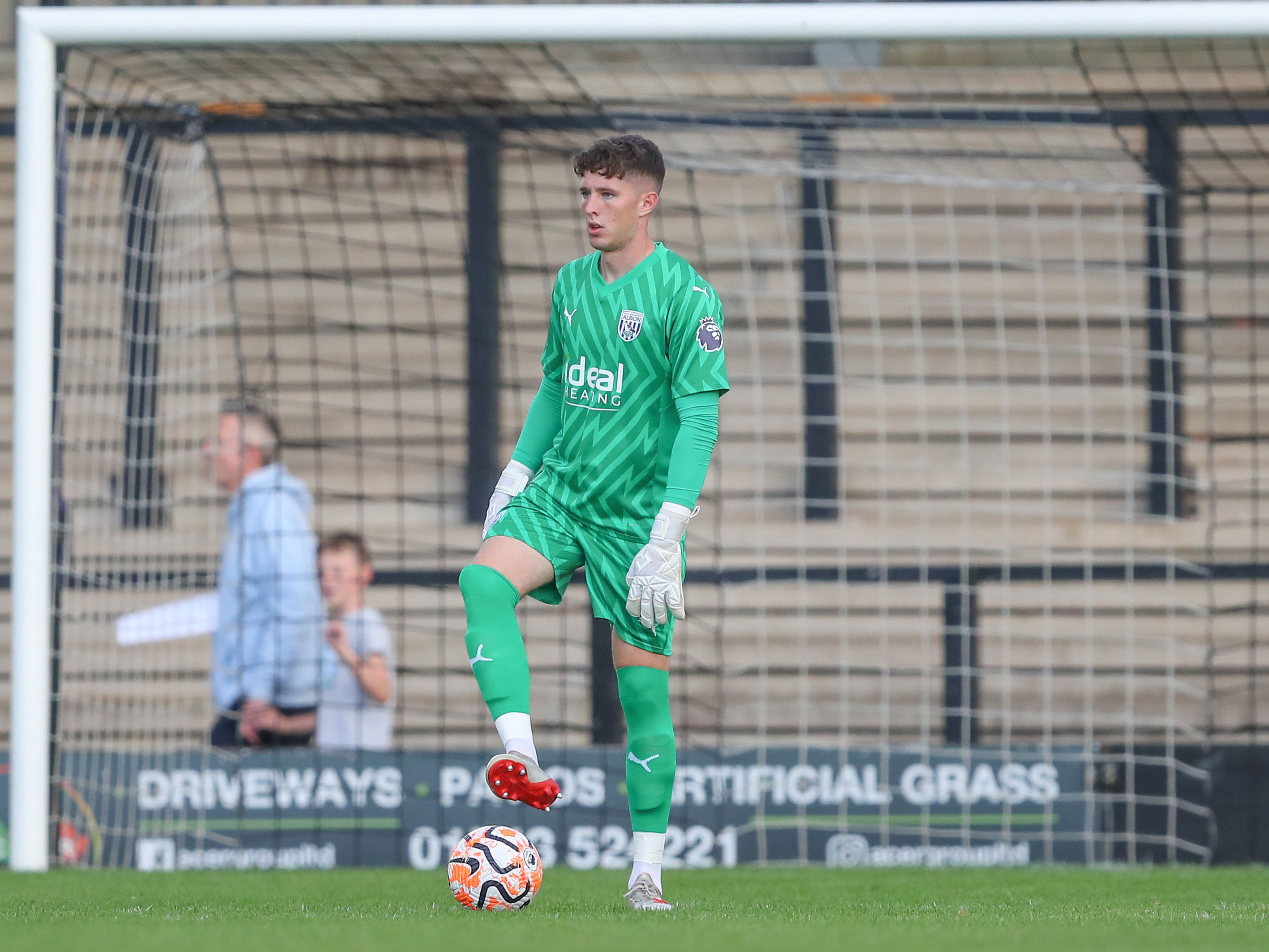 A photo of Ronnie Hollingshead in action for Albion's PL2 team in the 23/24 green goalkeeper kit