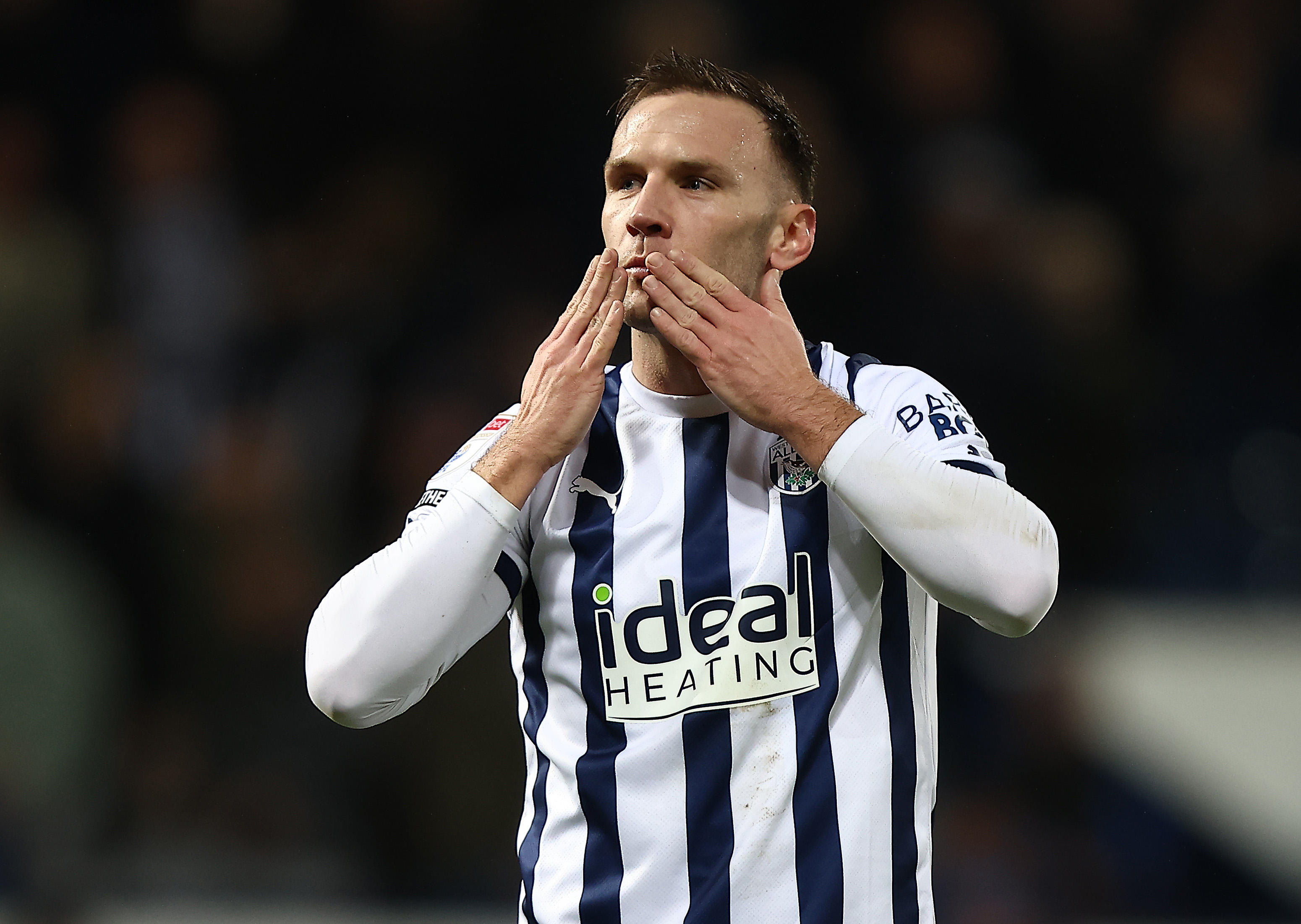 Andi Weimann blows supporters kisses at full-time