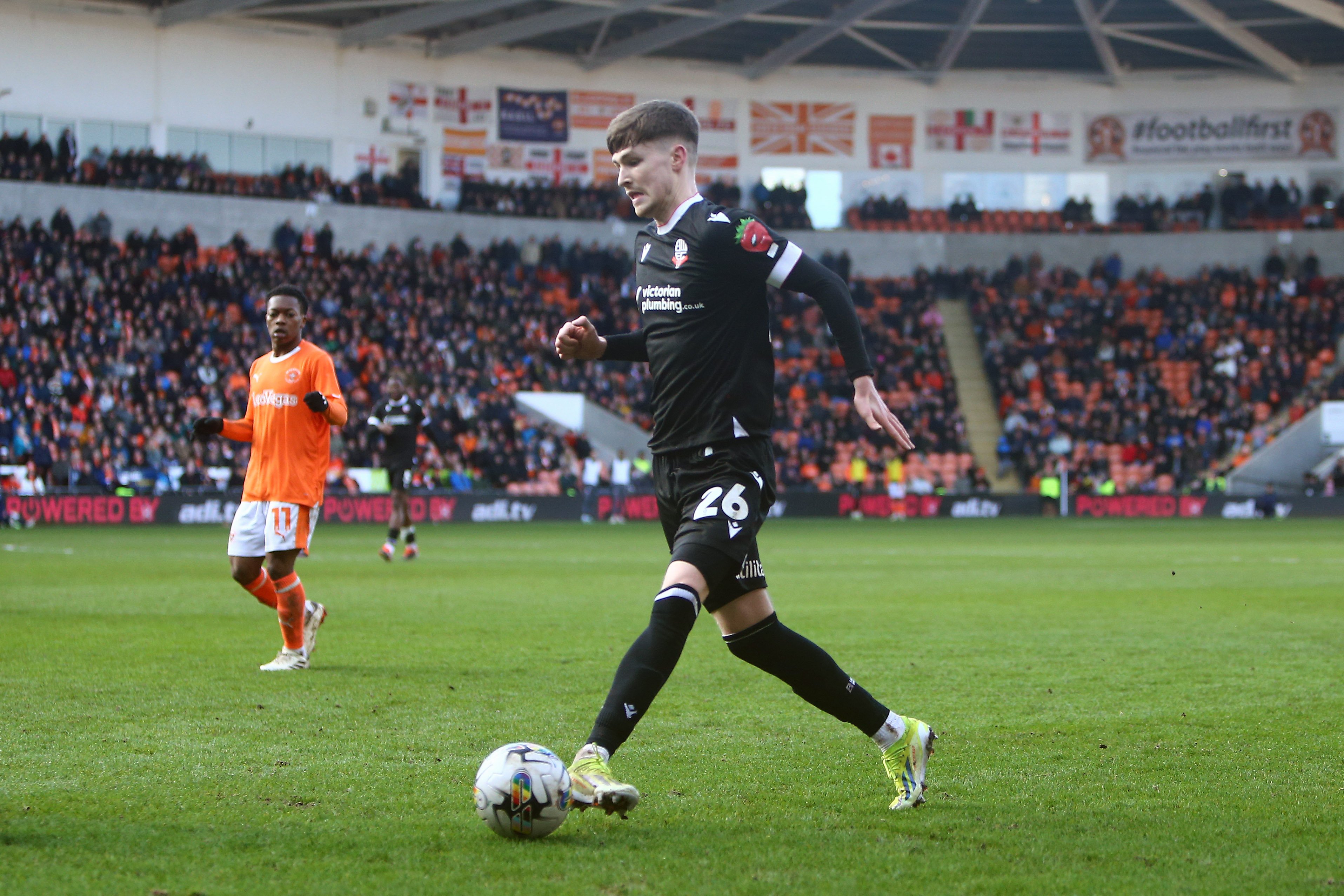 Zac Ashworth on the ball for Bolton during the game against Blackpool at Bloomfield Road