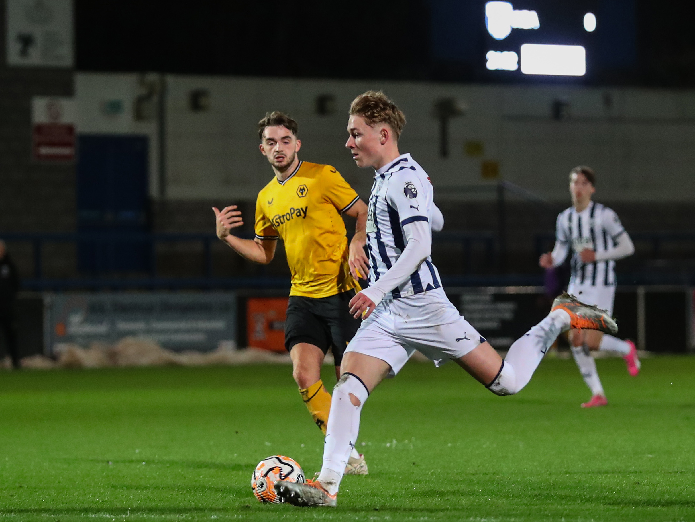 Ollie Bostock in action for Albion's PL2 team against Wolves at New Bucks Head