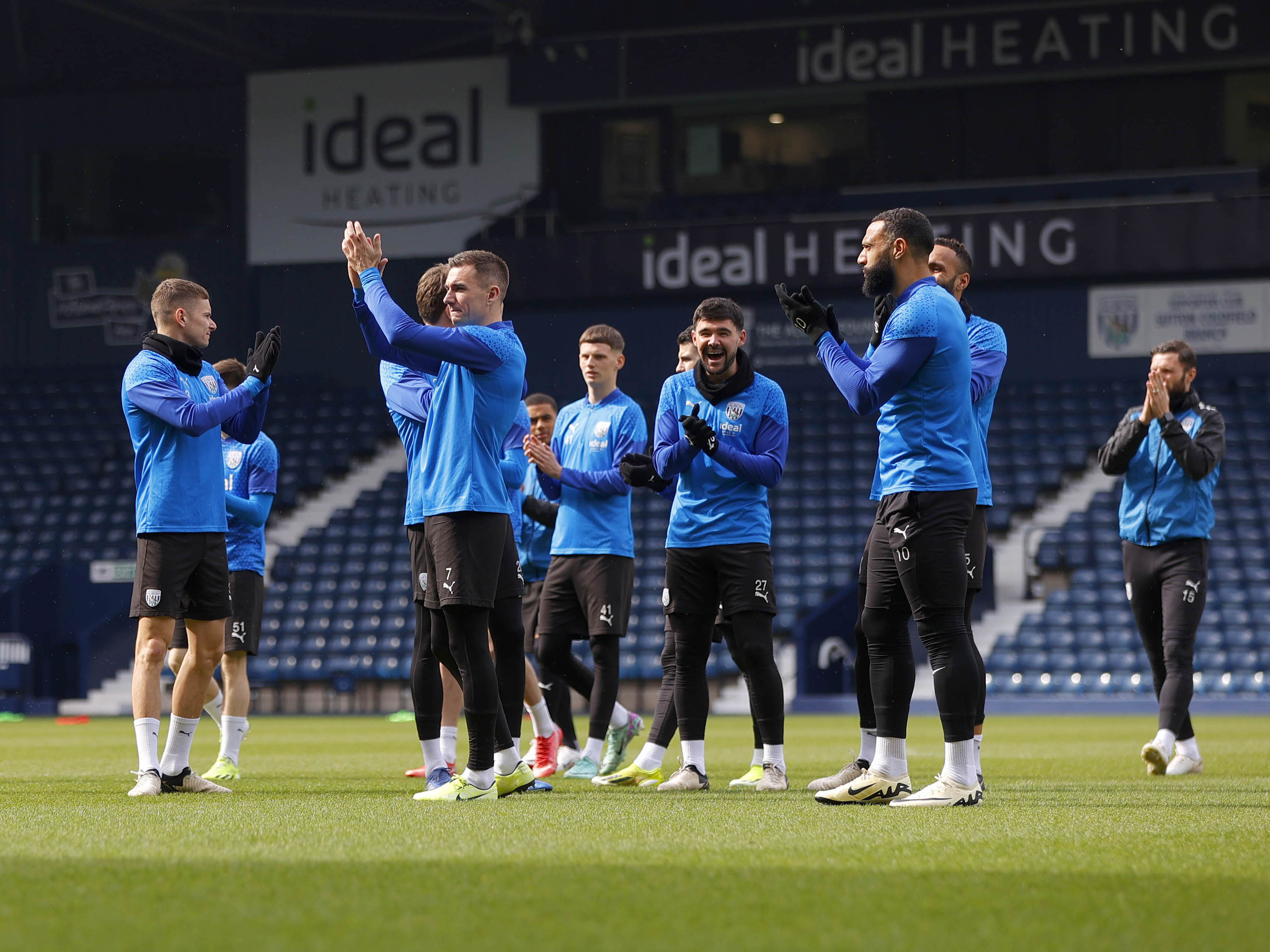 Albion players wave at and applaud supporters at The Hawthorns