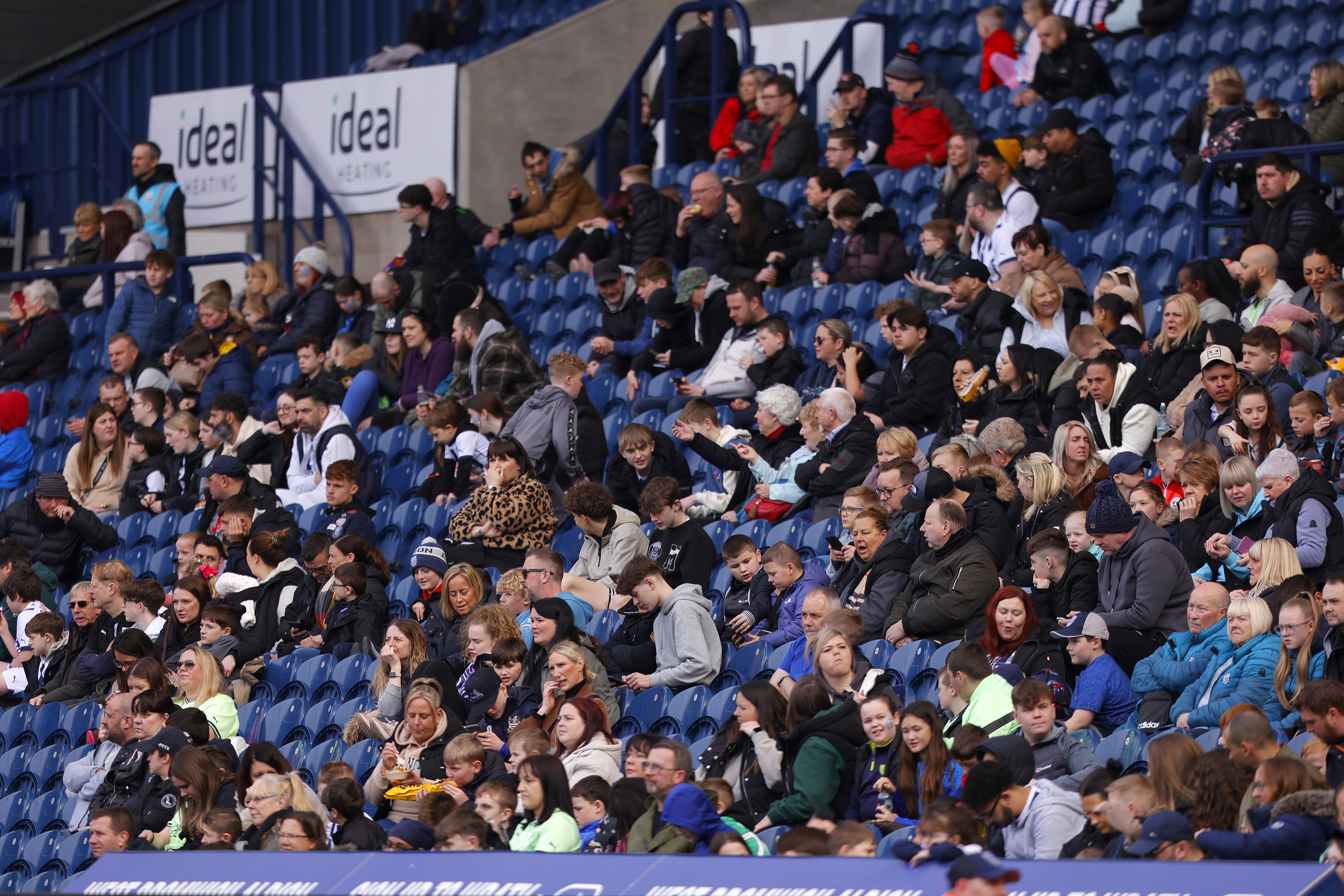 A general view of Albion fans in the East Stand at The Hawthorns watching a training session