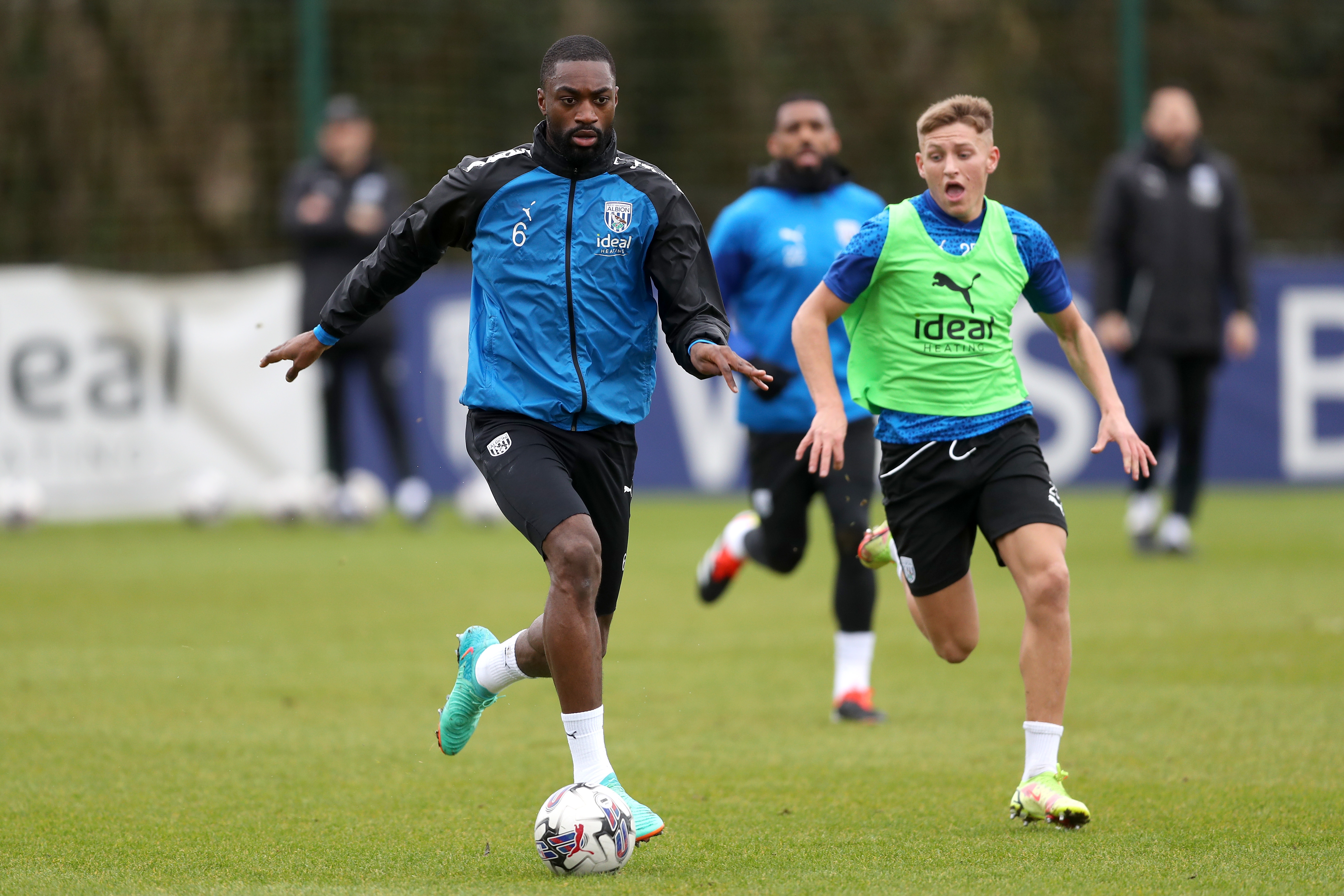 Semi Ajayi running with the ball during a training session