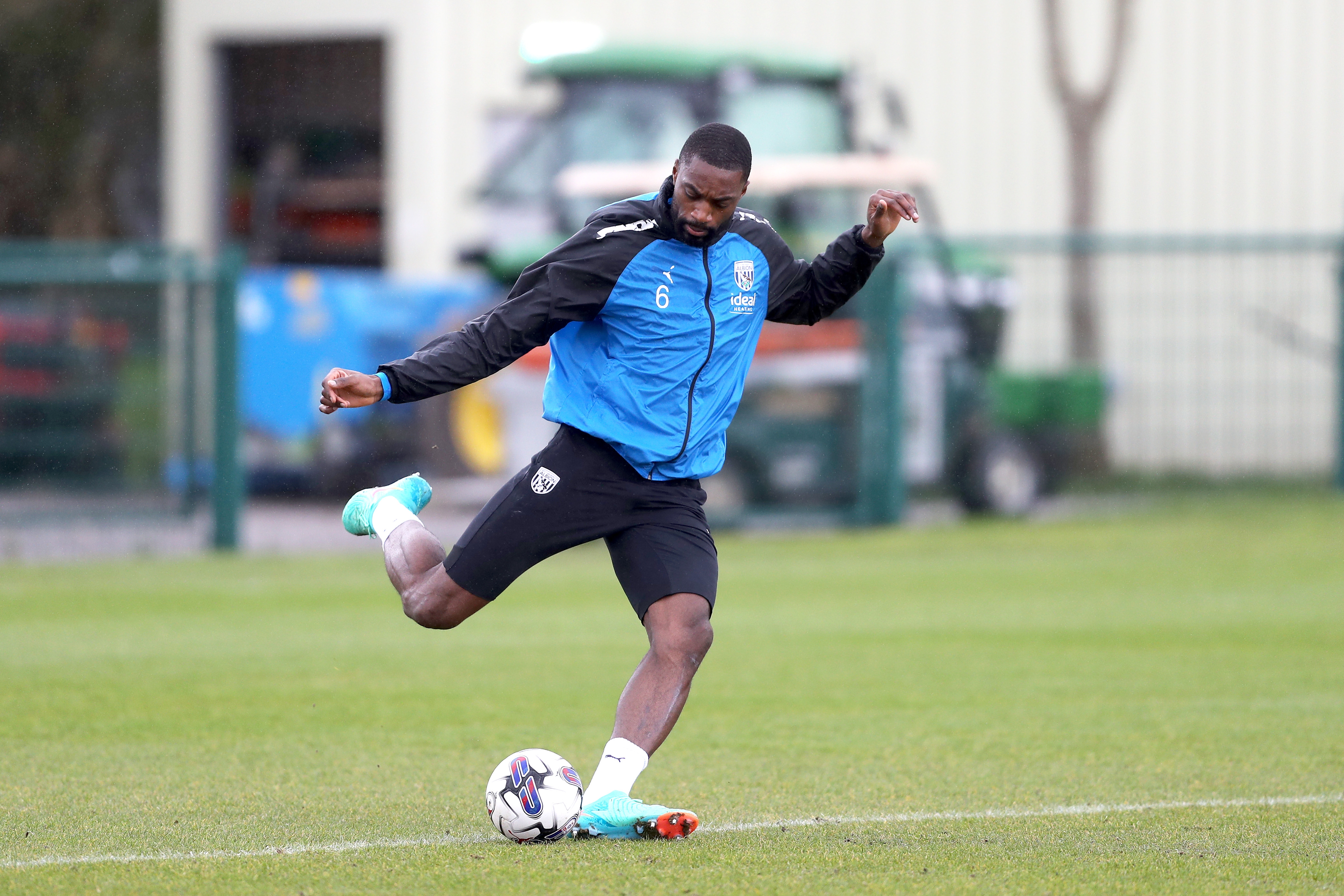 Semi Ajayi strikes the ball with his right foot in training 