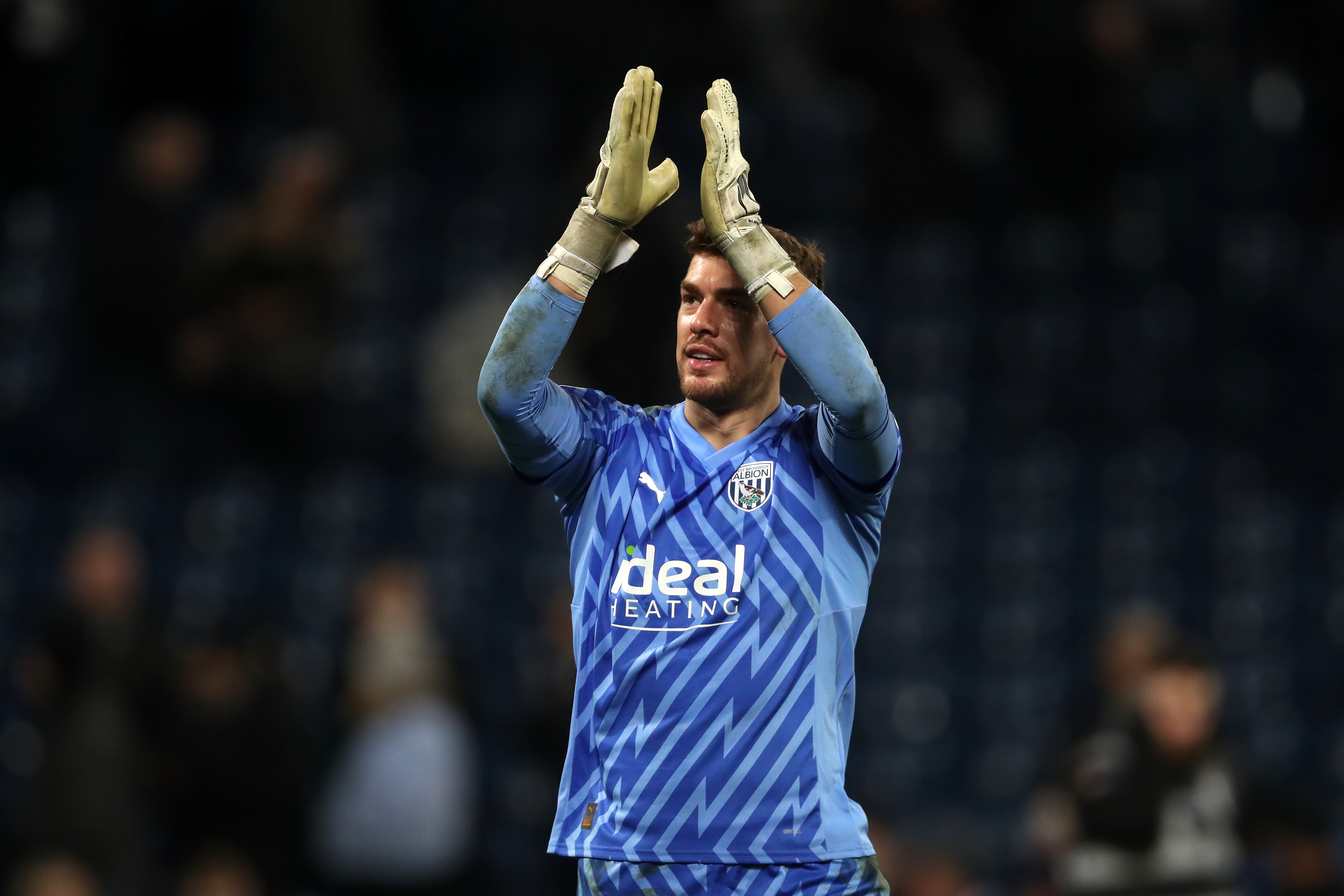 Alex Palmer applauds Albion fans following the win over Coventry 