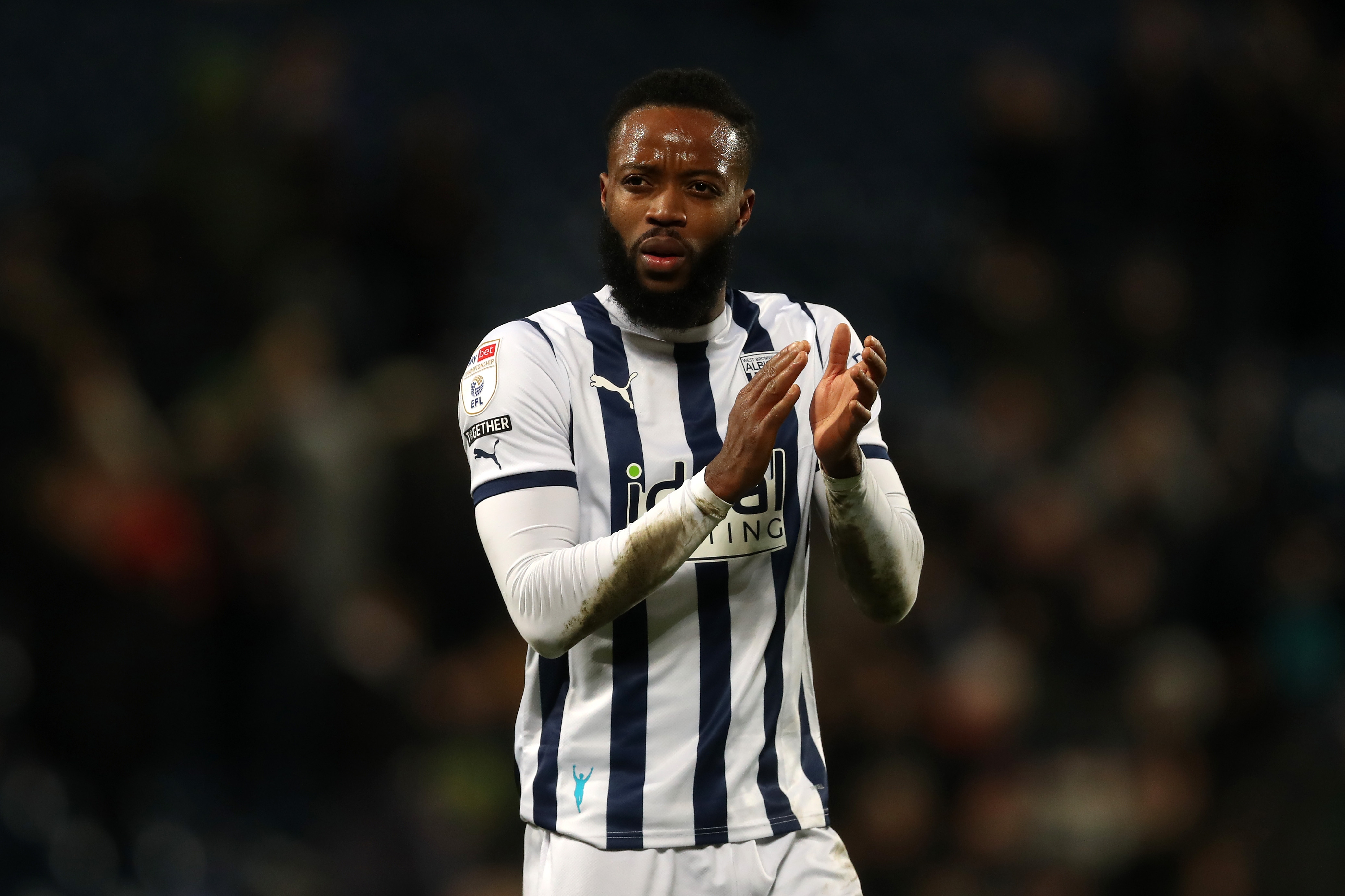 Nathaniel Chalobah applauds Albion fans following the win over Coventry 