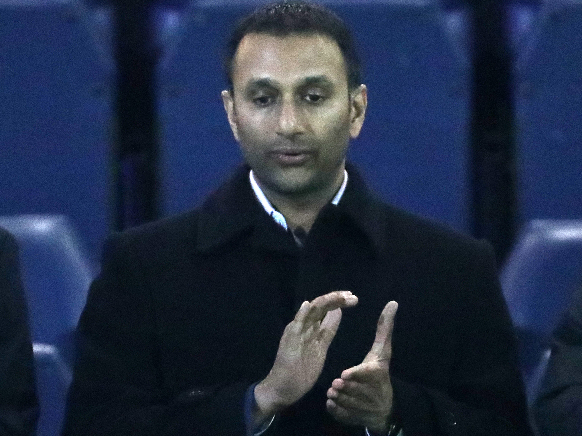 Albion Chairman Shilen Patel applauding the players after the full-time whistle at QPR 