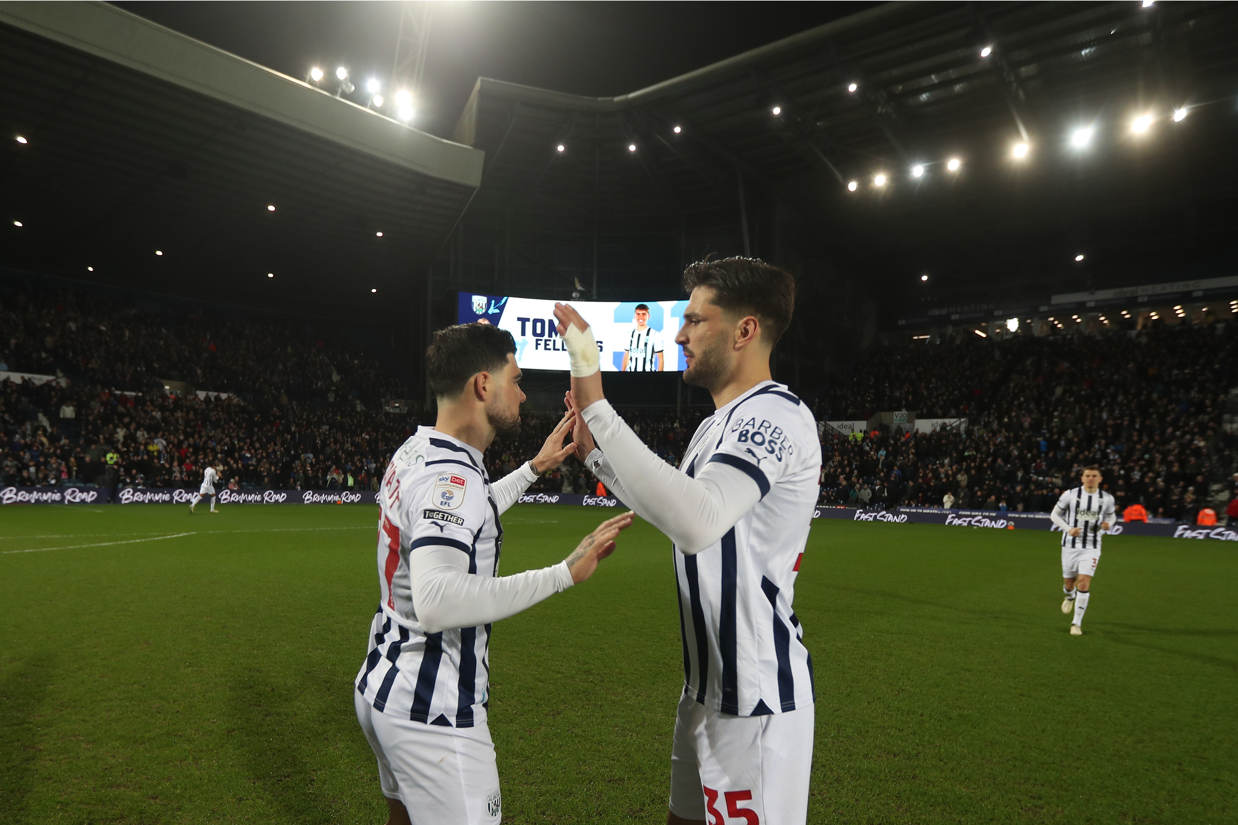 Alex Mowatt and Okay Yokuslu high five each other before playing Coventry 