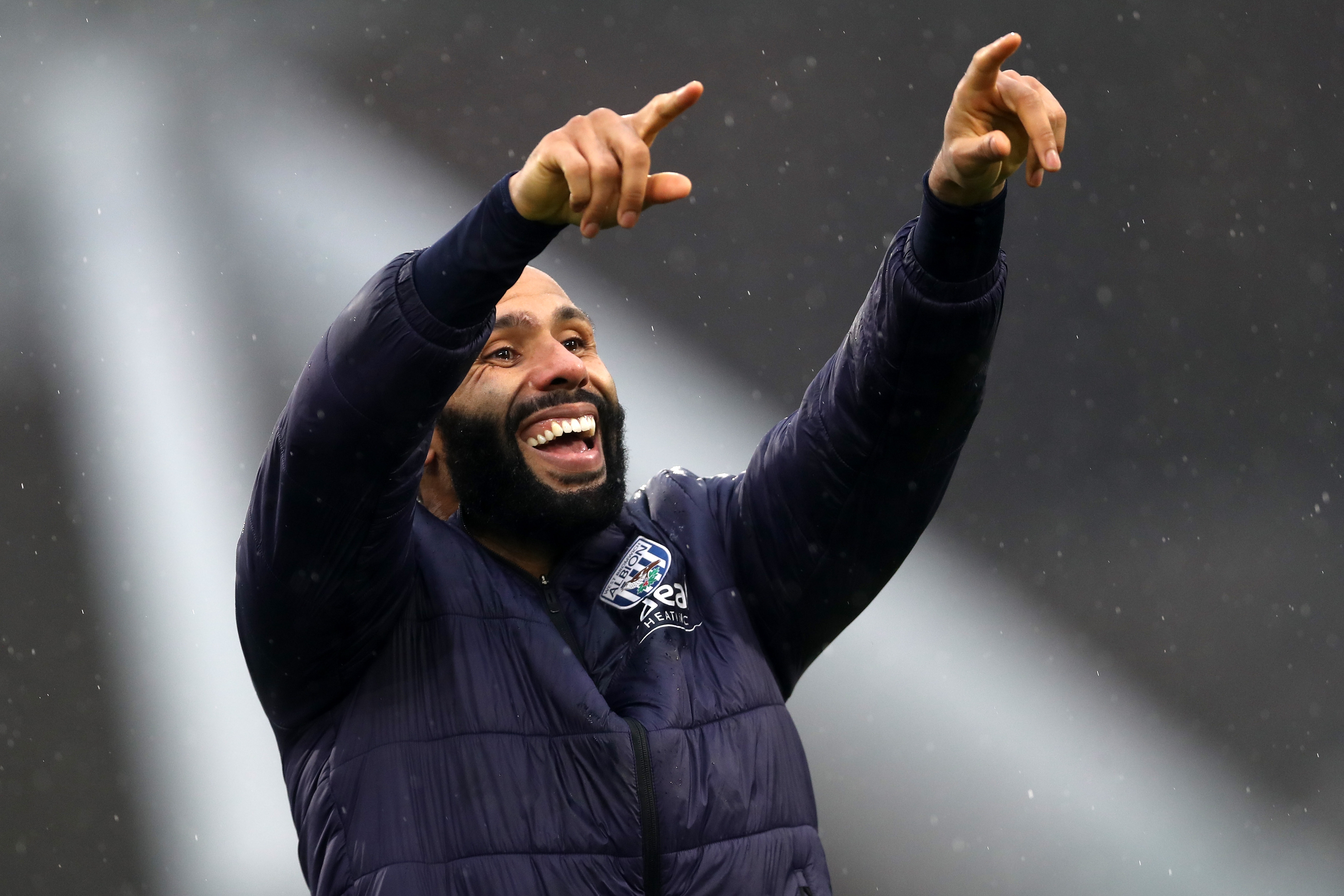 Kyle Bartley celebrates at full-time after Albion's win against Huddersfield 
