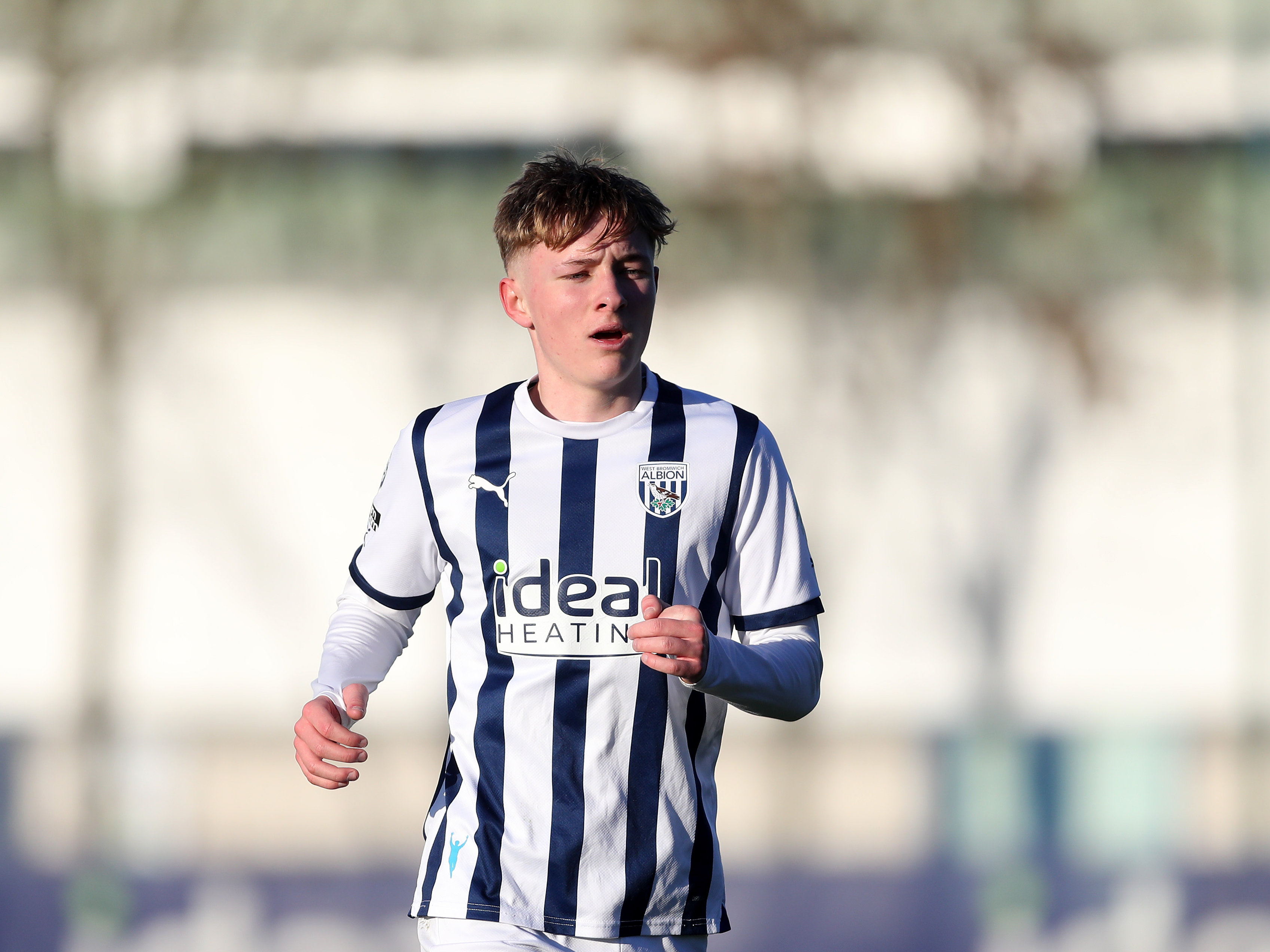 A photo of Albion scholar Ollie Bostock in the 23/24 home kit