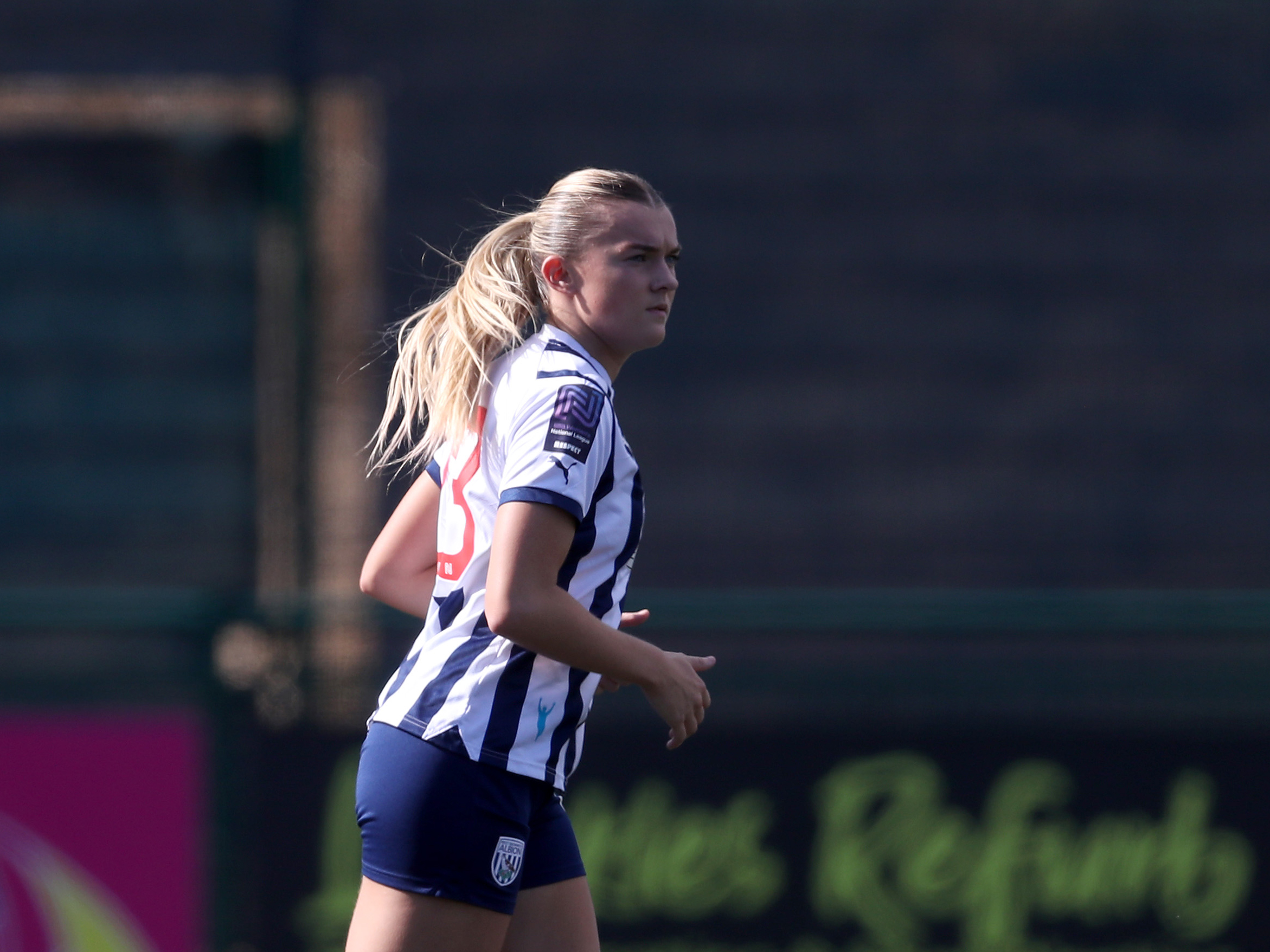 Taylor Reynolds in action for Albion Women wearing the home kit