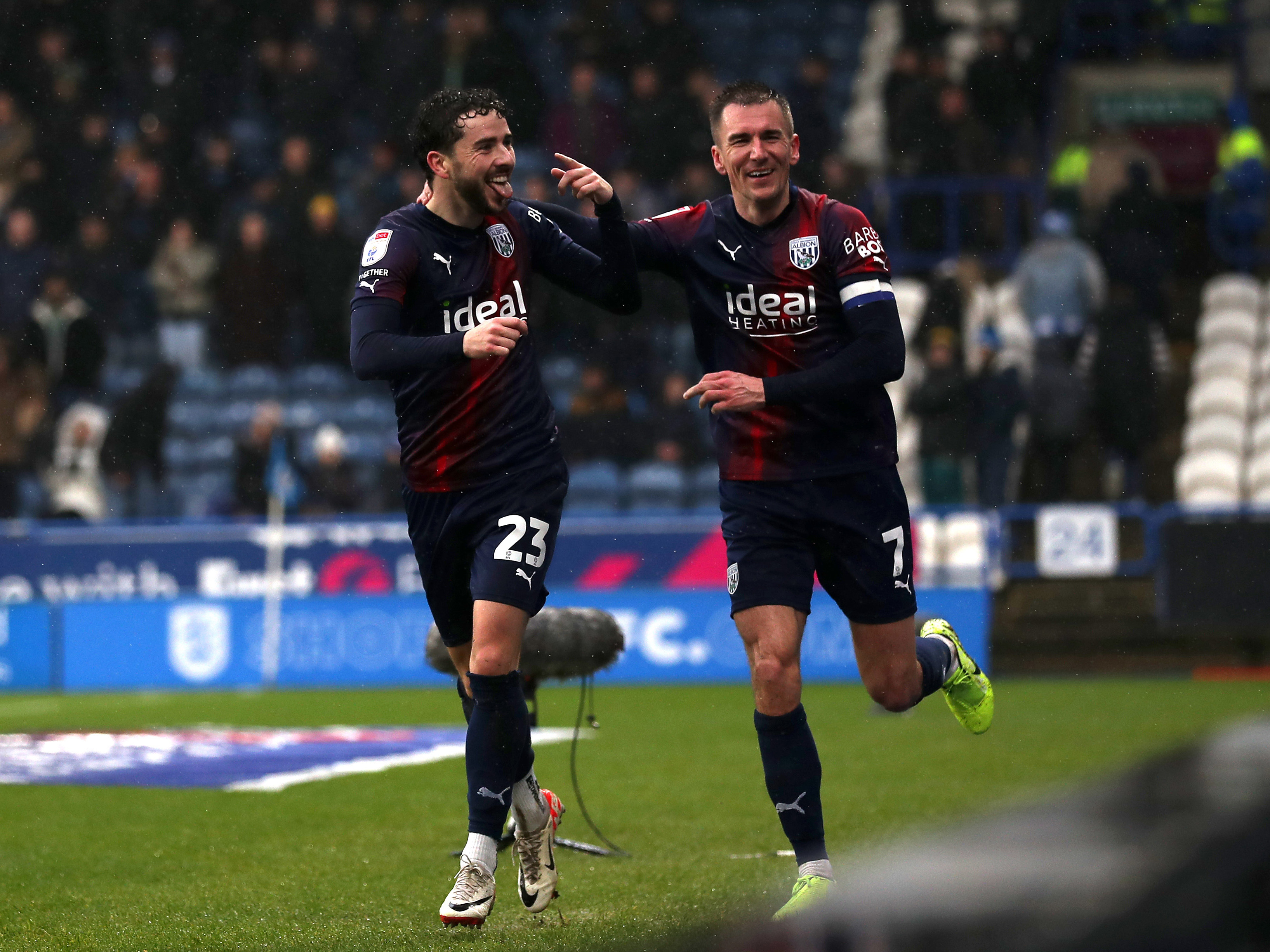 An image of Mikey Johnston and Jed Wallace celebrating a goal
