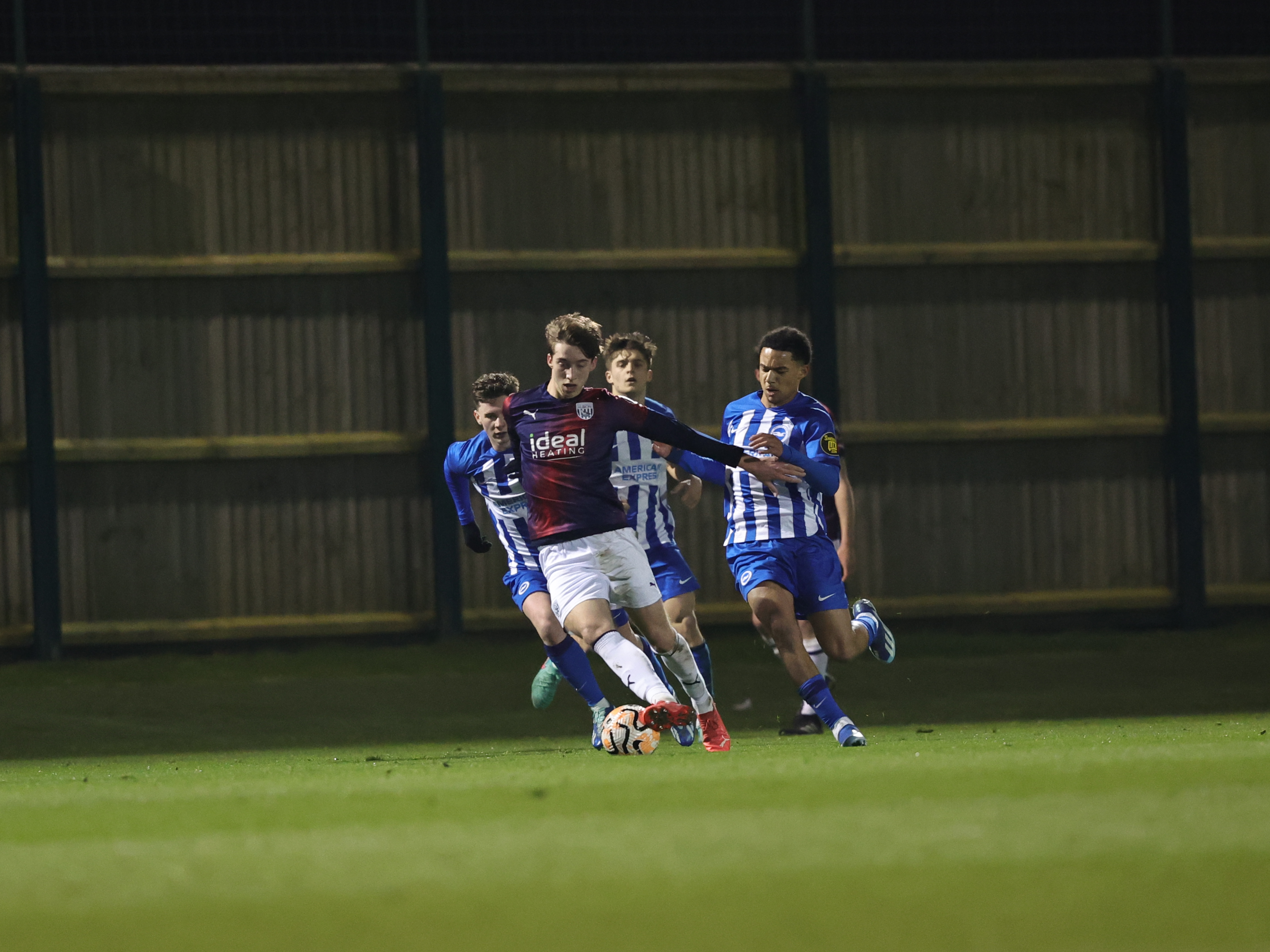 A photo of Harry Whitwell on the ball during Albion's PL2 match v Brighton