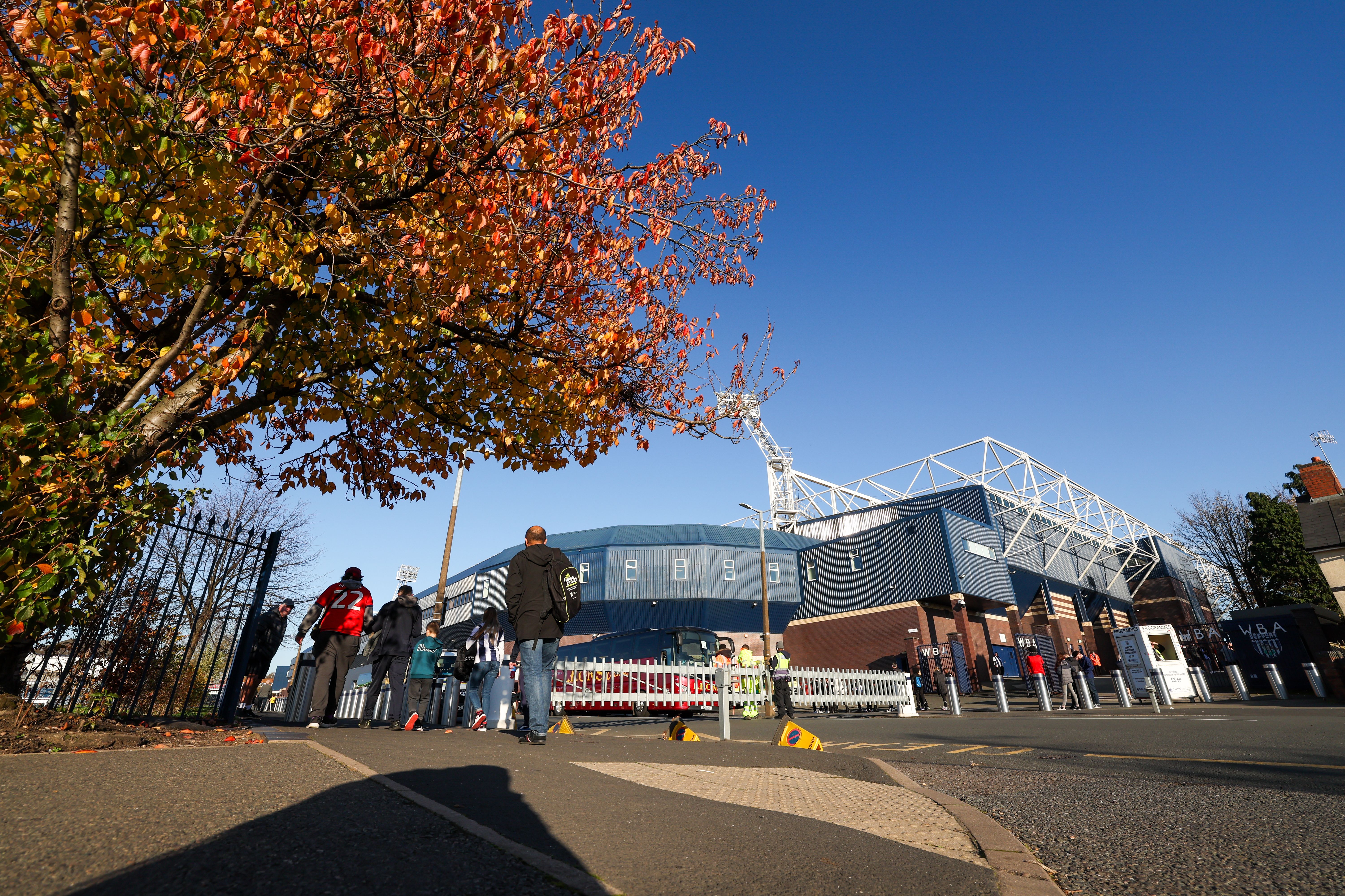 A general view of the outside of The Hawthorns with a blue sky above