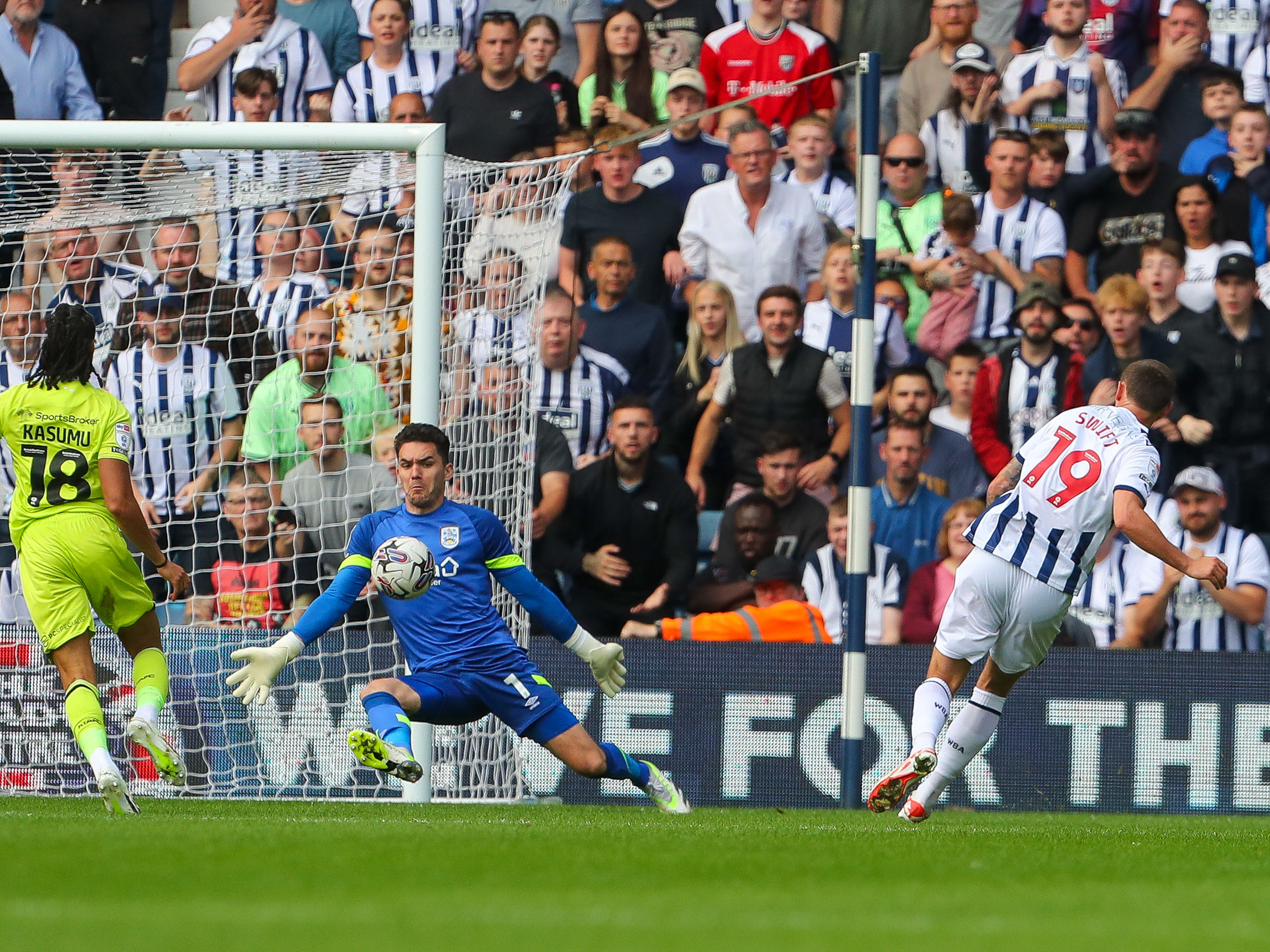 John Swift shoots and scores against Huddersfield Town at The Hawthorns in September 2023